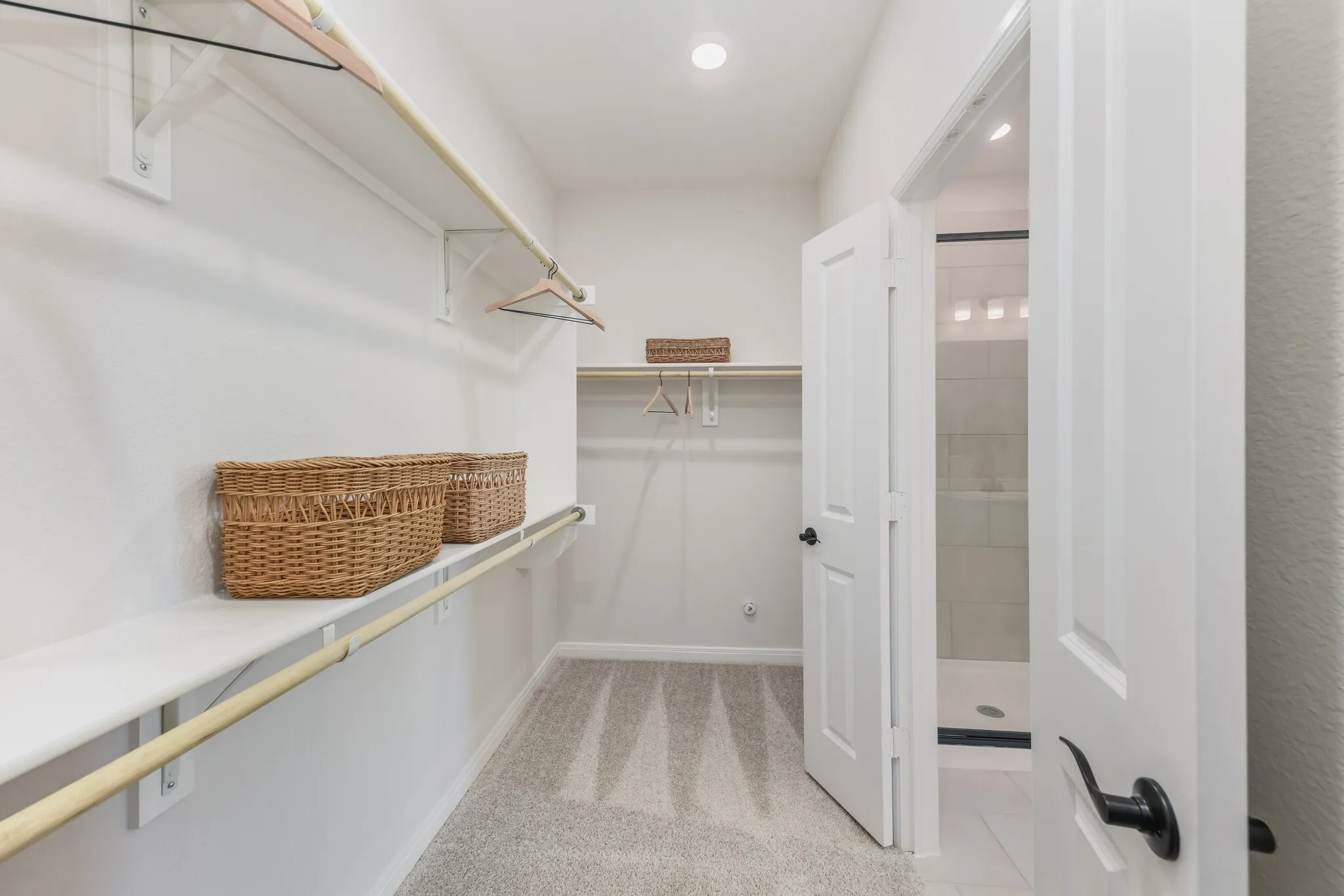 No fighting over closet space in this spacious owner's closet!