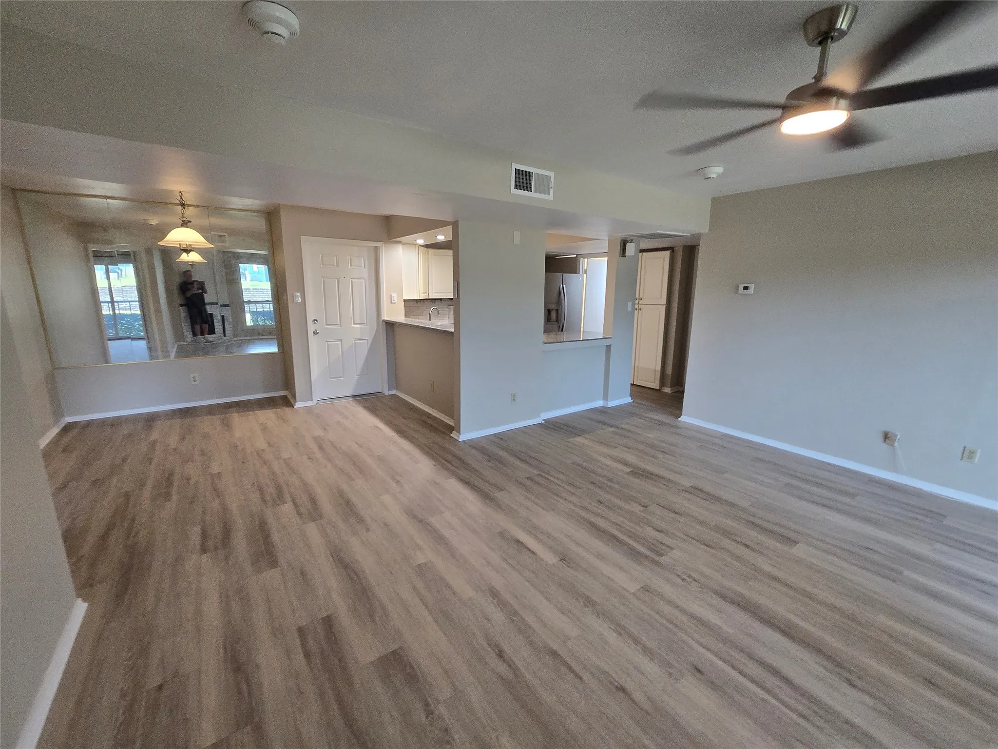 Living room facing the kitchen