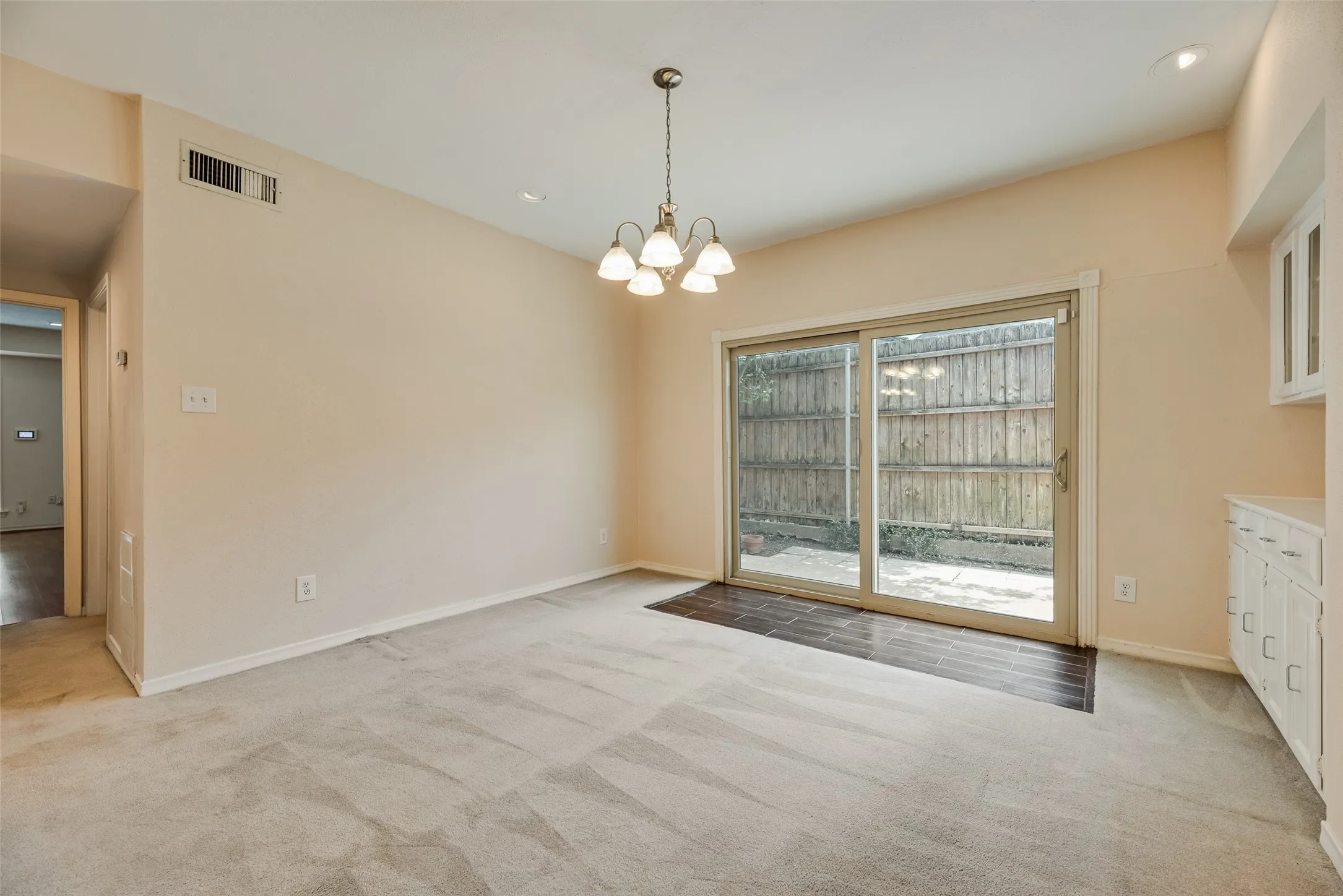 Oversized dining room with built-in cabinetry