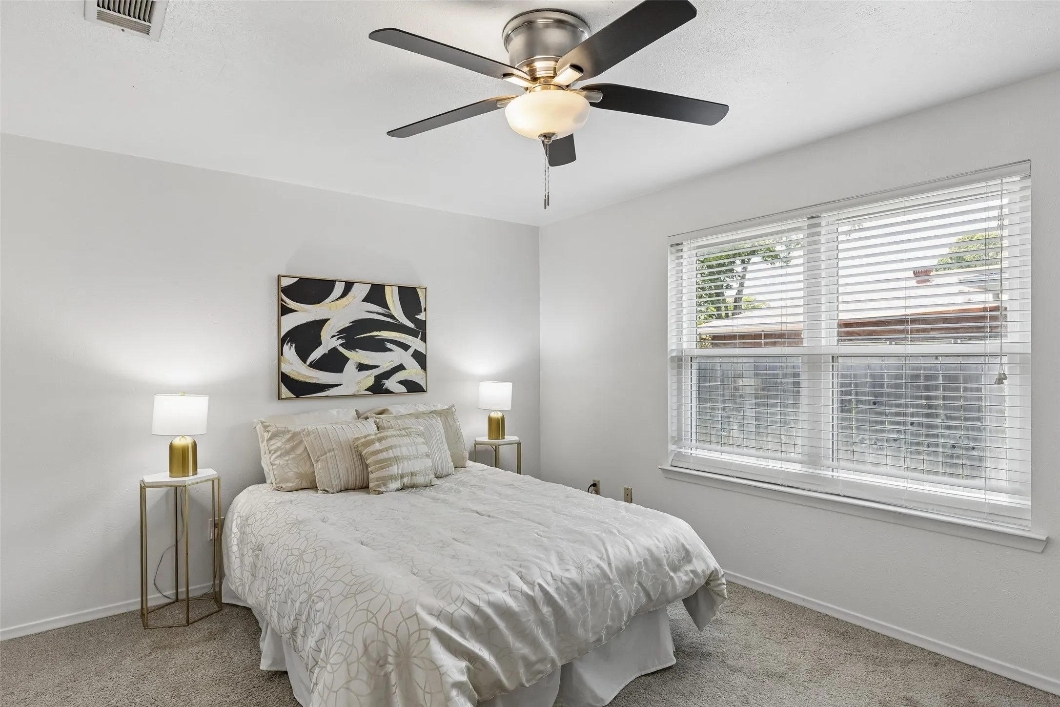 Bedroom 3 is the largest of the 4 bedrooms. This room contains 2 HUGE walk in closets. There are 2 more walk in closets nearby for a total of 4.
