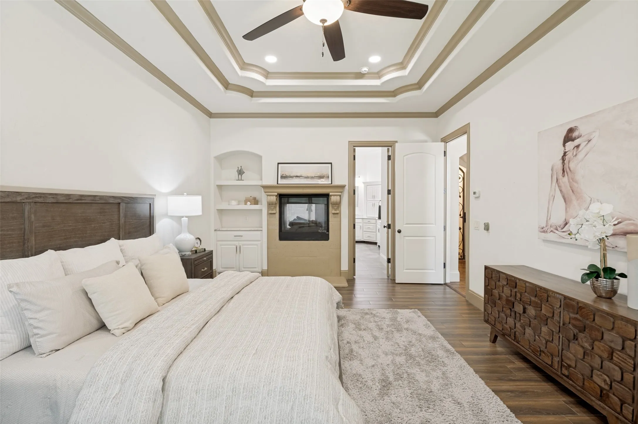 Primary Bedroom with See Through Fireplace
