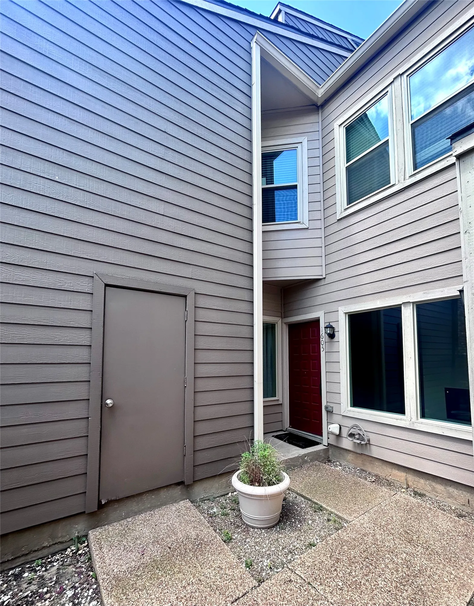 Upon entering the security gate, this unit features a one car garage and additional storage space.