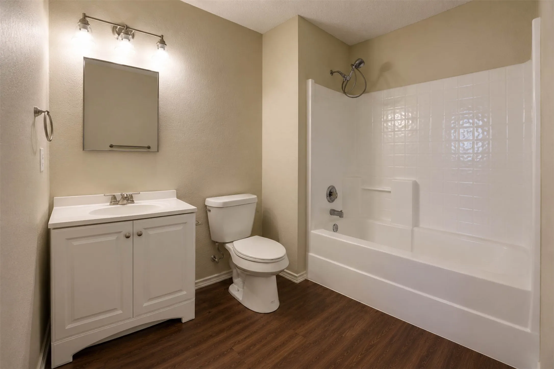 Sparkling bathrooms with new decorator vanities and new lighting