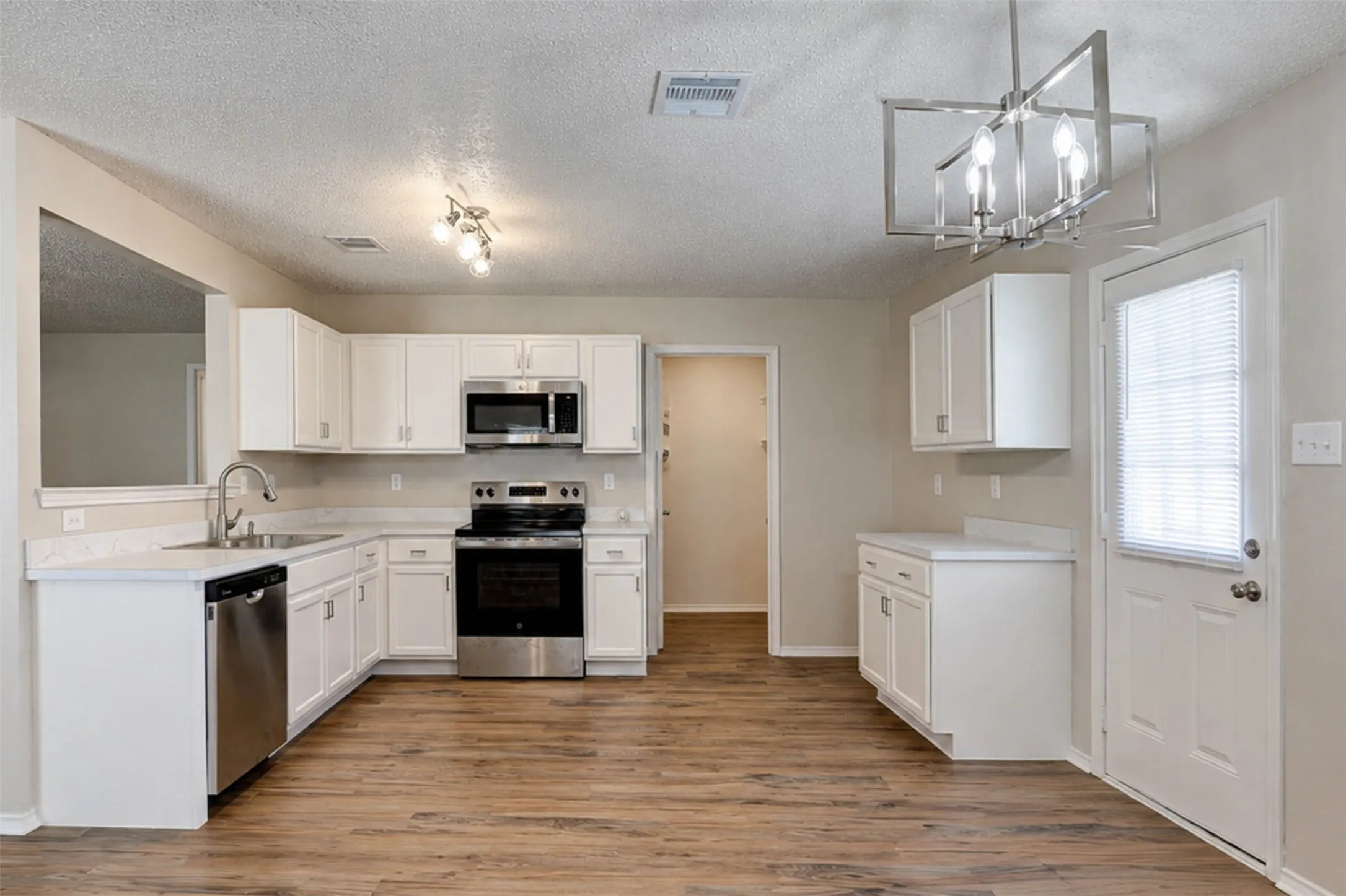 WOW! This kitchen is like new! All new cabinets and appliances