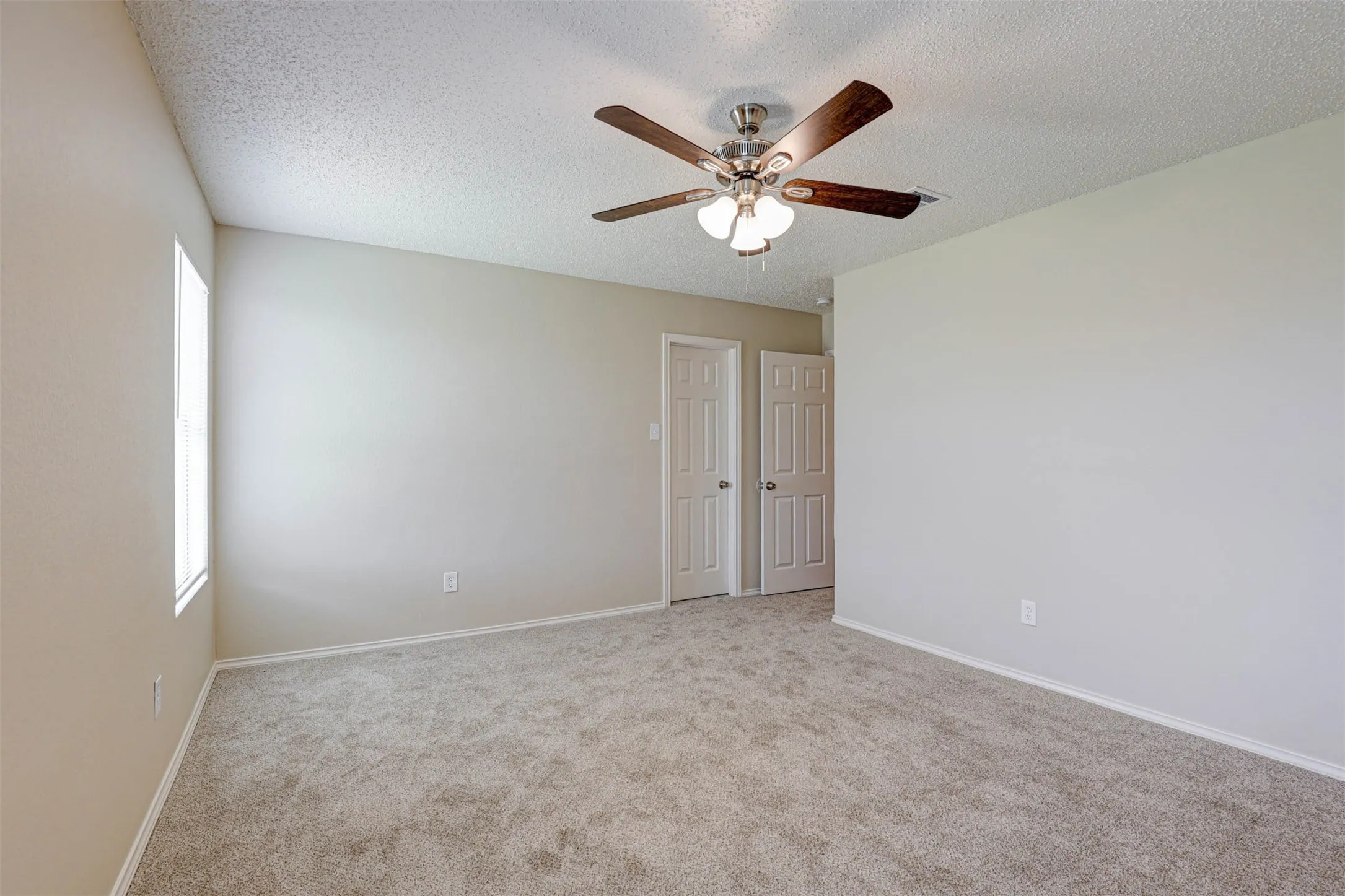 Bedroom 2.  New lighting/fans and flooring in every room