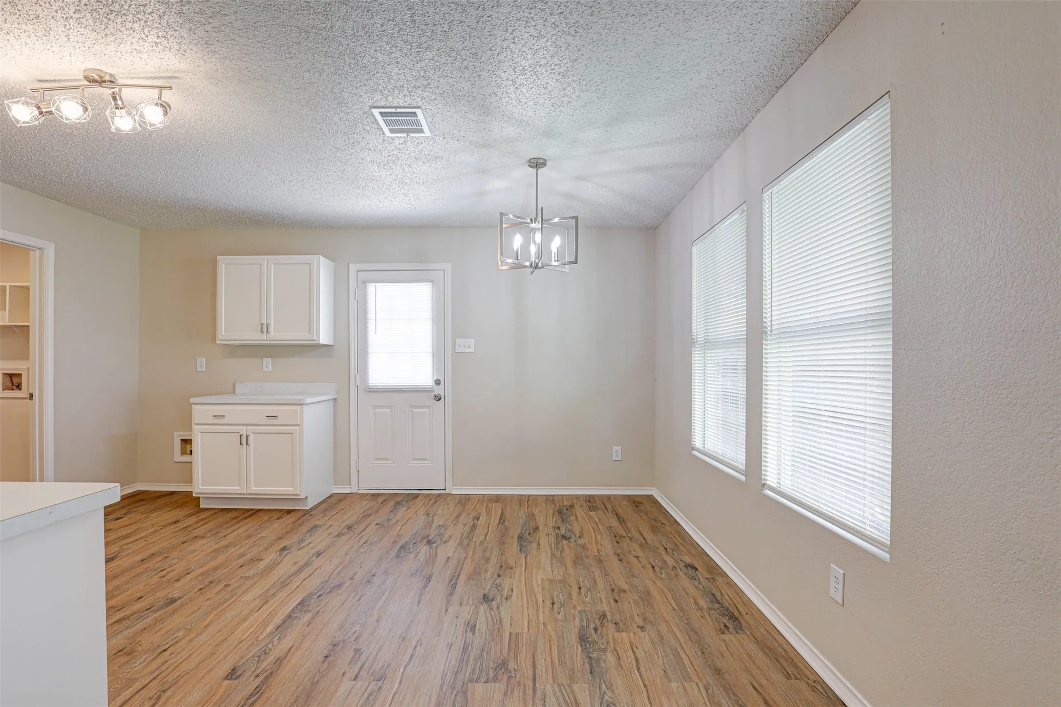 Lots of natural lighting in the spacious breakfast area