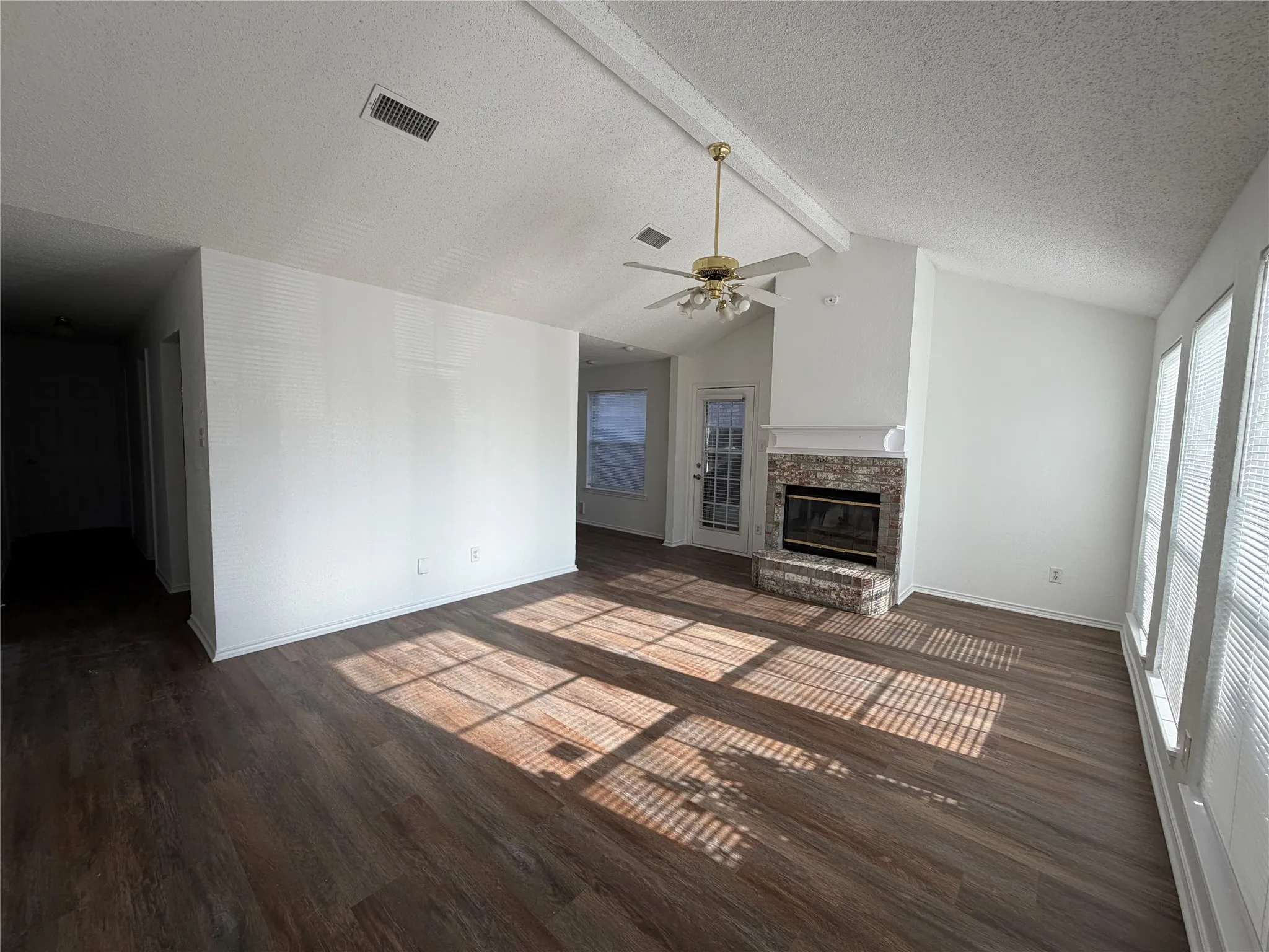 Living room with wood burning fireplace