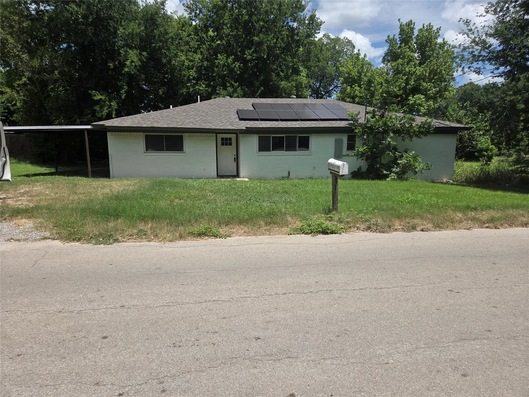 Front of Property with carport