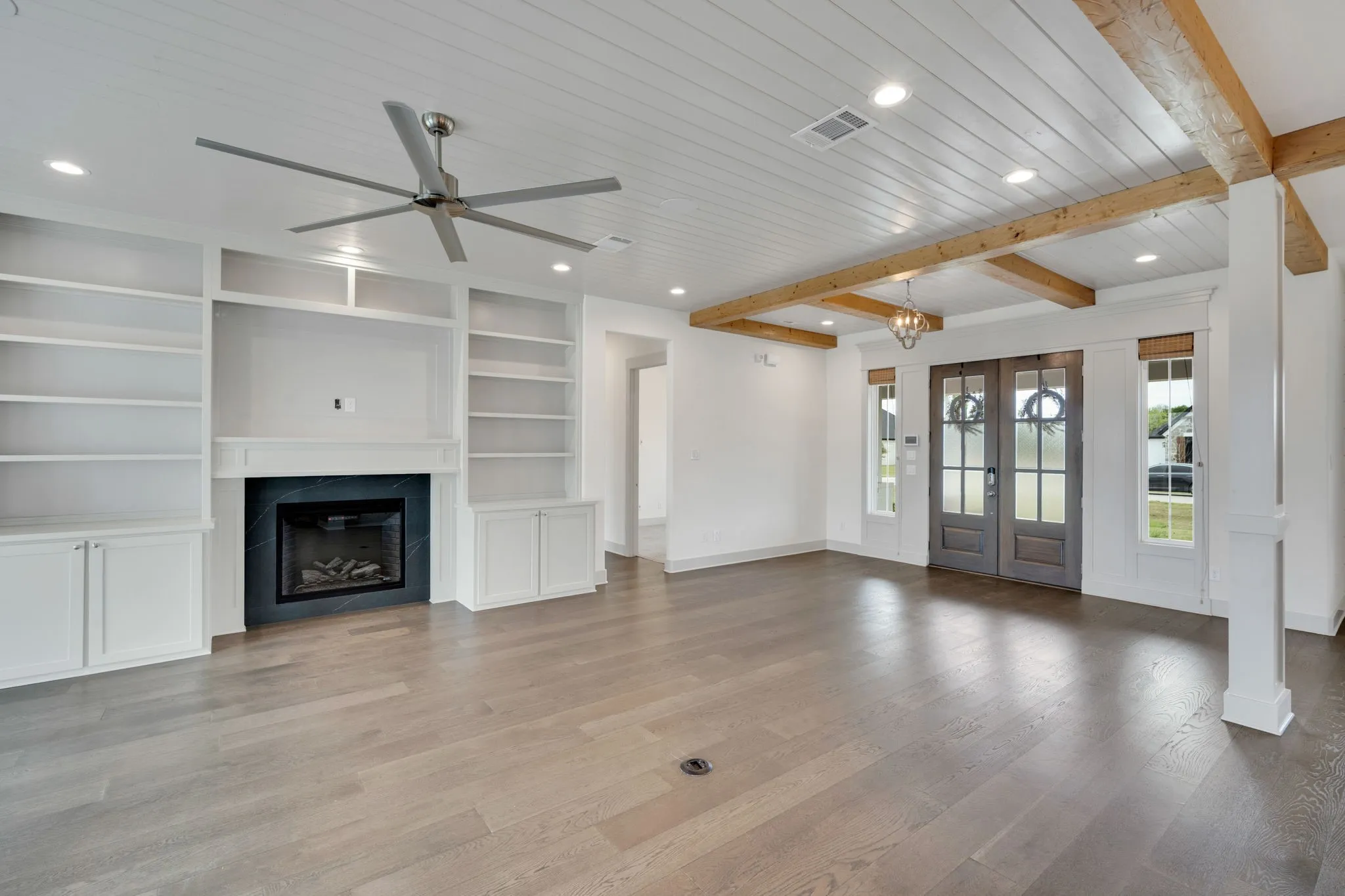 Wood floors and fireplace