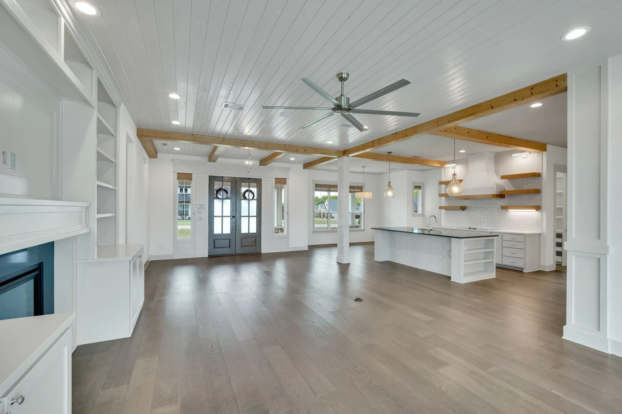 Open floor plan with beams
