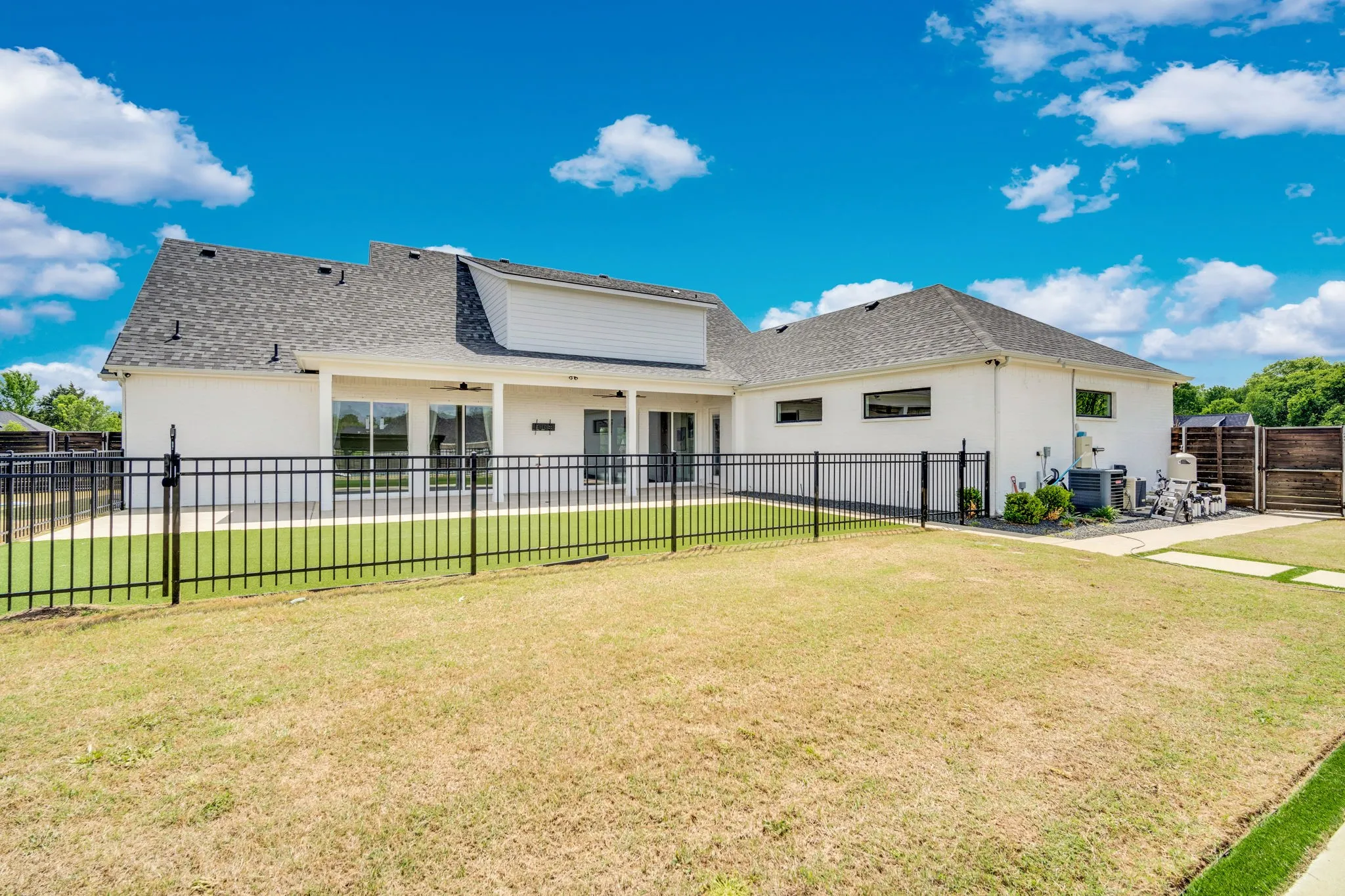 Fence between house and pool