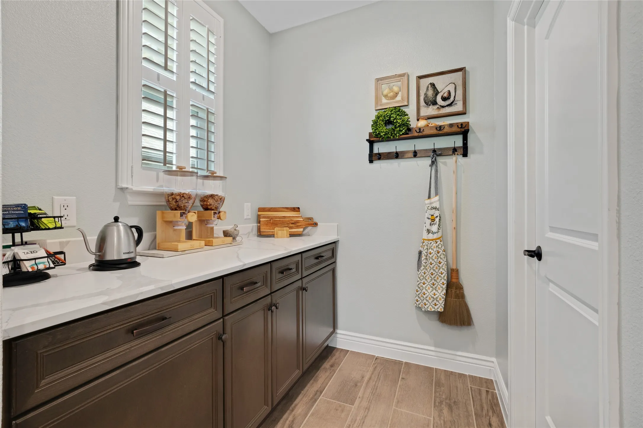 Butler's area directly across from the walk-in pantry.