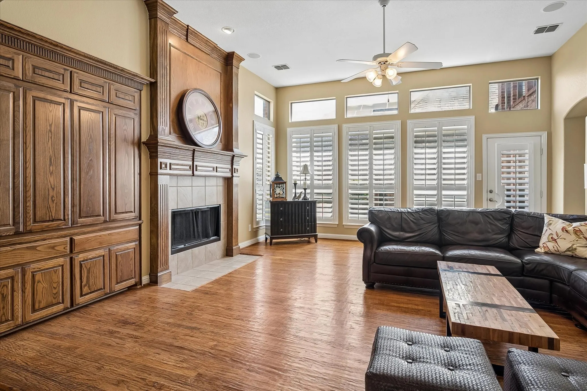 First-Floor Family Room Featuring a Built-In TV Entertainment Wall