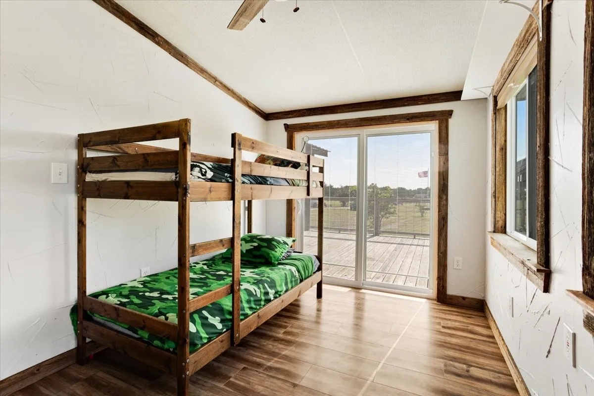 Bedroom with access to rear patio deck
