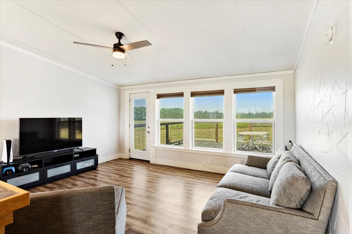 Spacious living room with beautiful views and access to patio deck