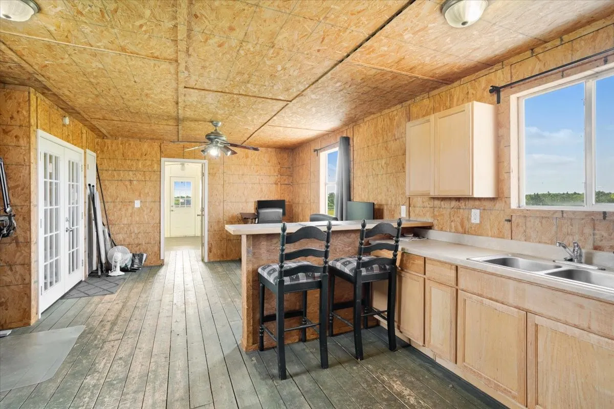 Open living and kitchen area in barn living quarters