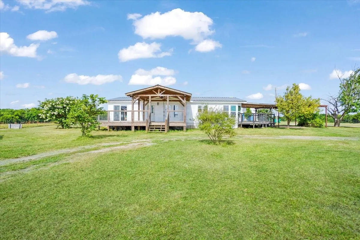 Front view of House with covered front porch