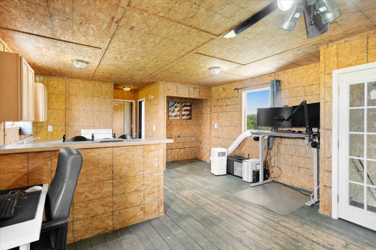 Open living and kitchen area in barn living quarters