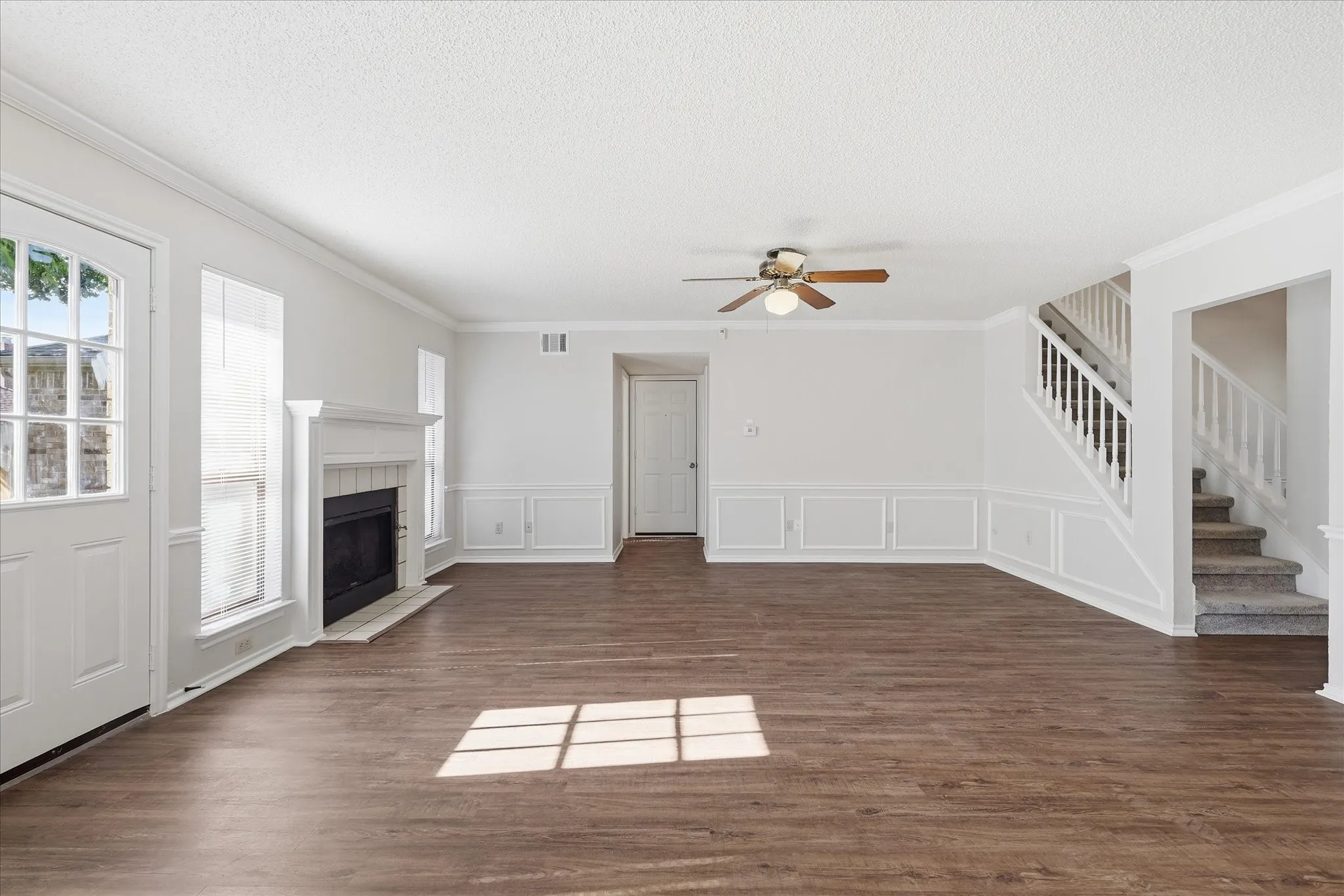 The kitchen opens directly to the family room, creating a comfortable central space for everyday living and entertaining.