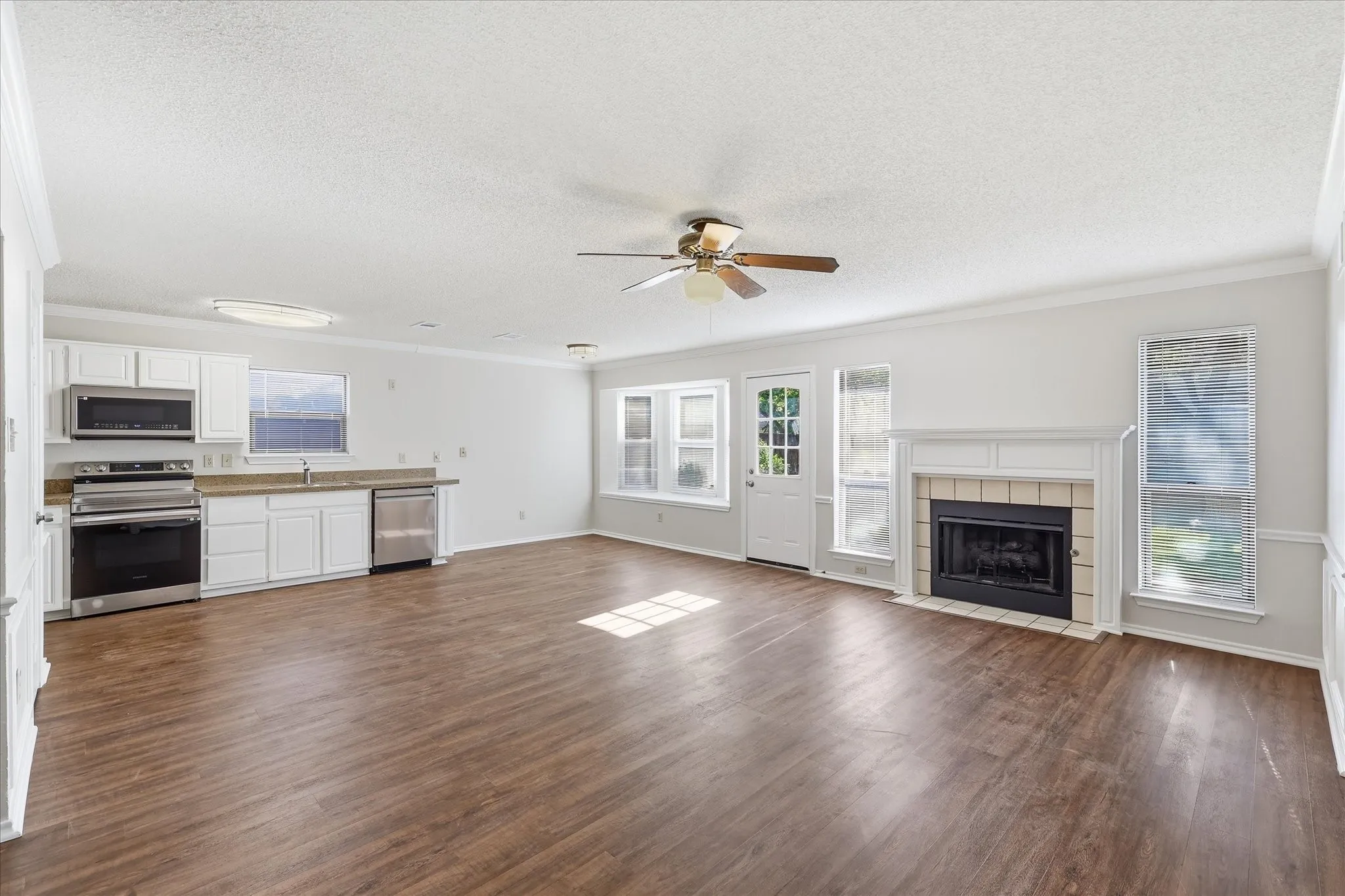 The kitchen opens directly to the family room, creating a comfortable central space for everyday living and entertaining.