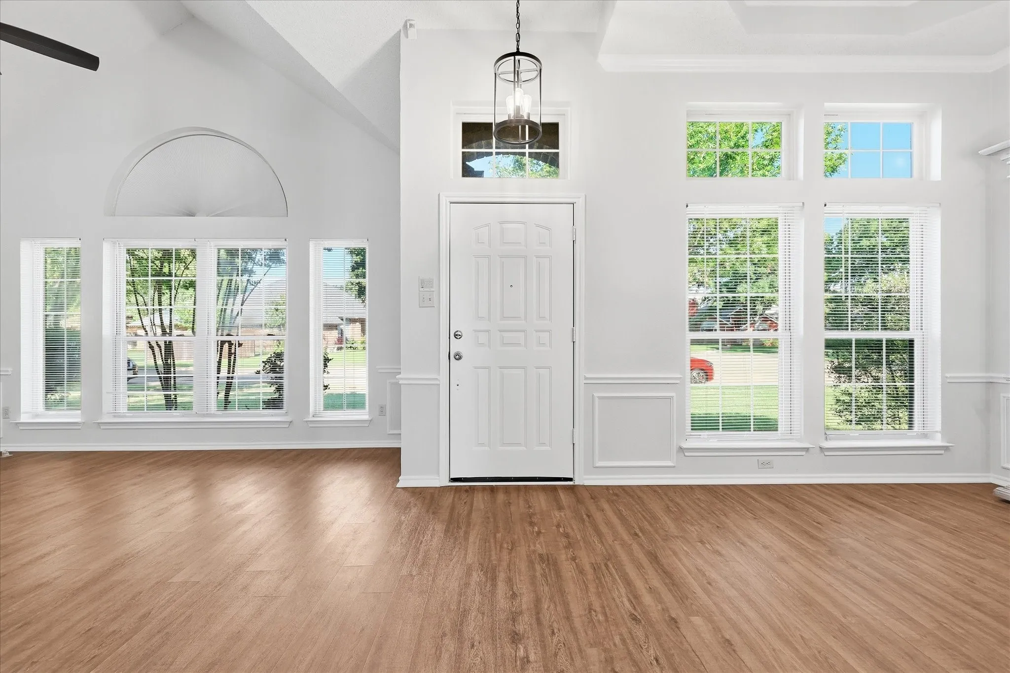 Step inside to soaring ceilings, dramatic windows and an abundance of natural light that immediately showcases the home’s bright, open design.
