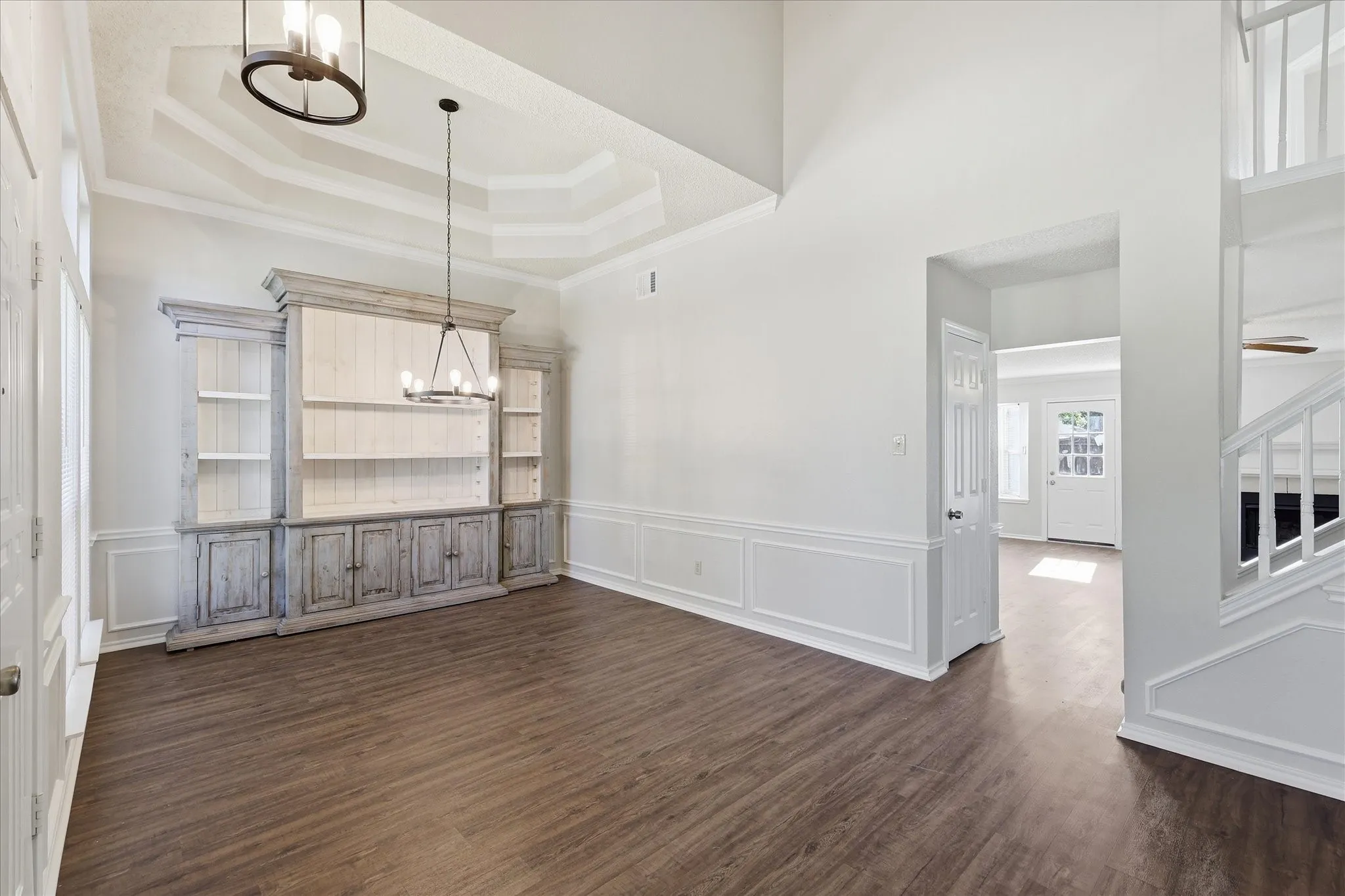 The spacious dining room opens beautifully to the entry and main living areas, offering an inviting flow for entertaining.
