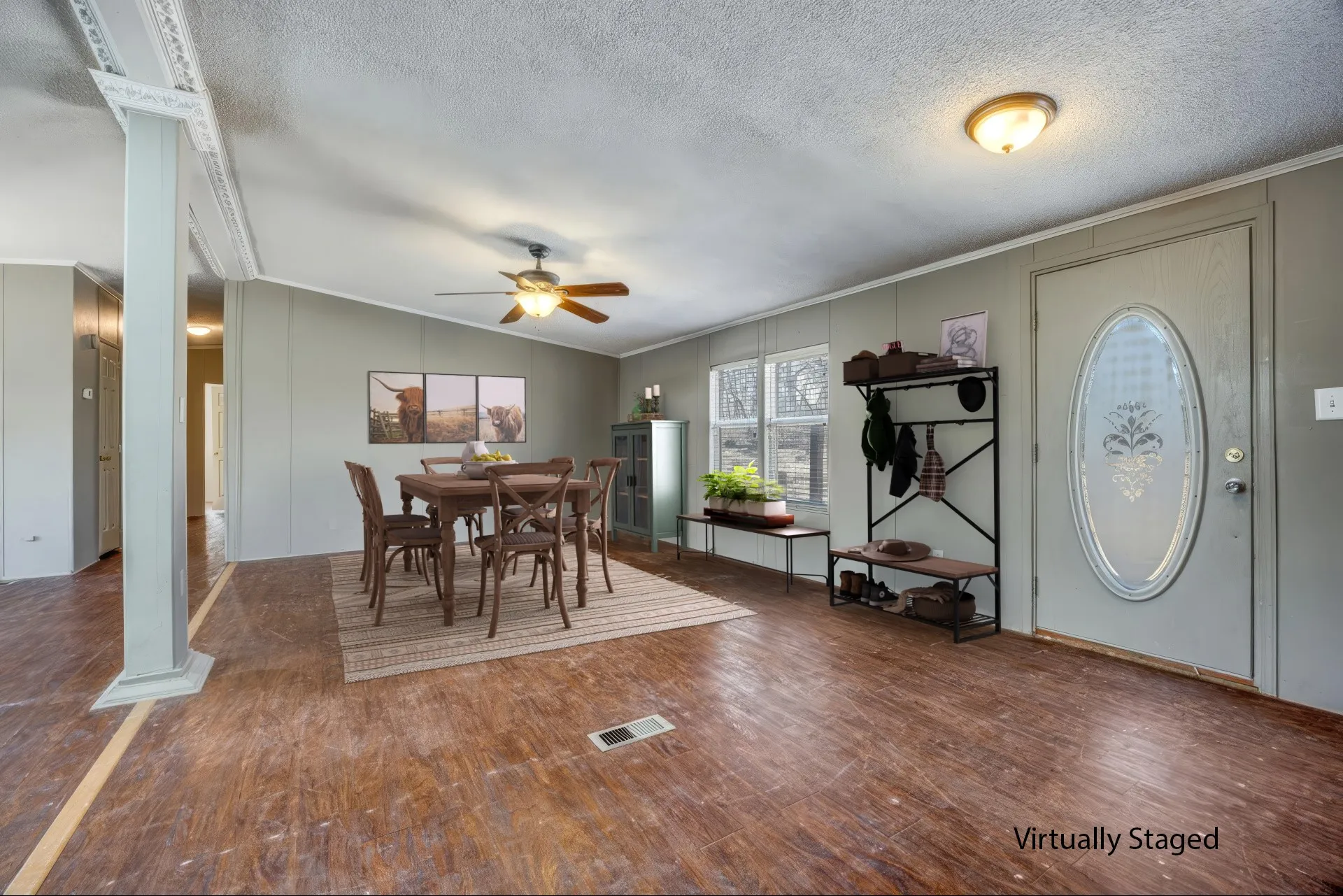 Front Door opens into large dining, living, kitchen area.  Great for family get togethers at the lake!  Virtually Staged!