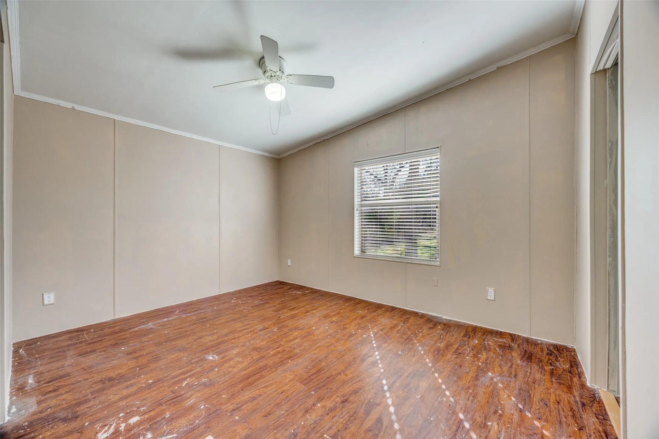 Large secondary bedroom that has shared bath.