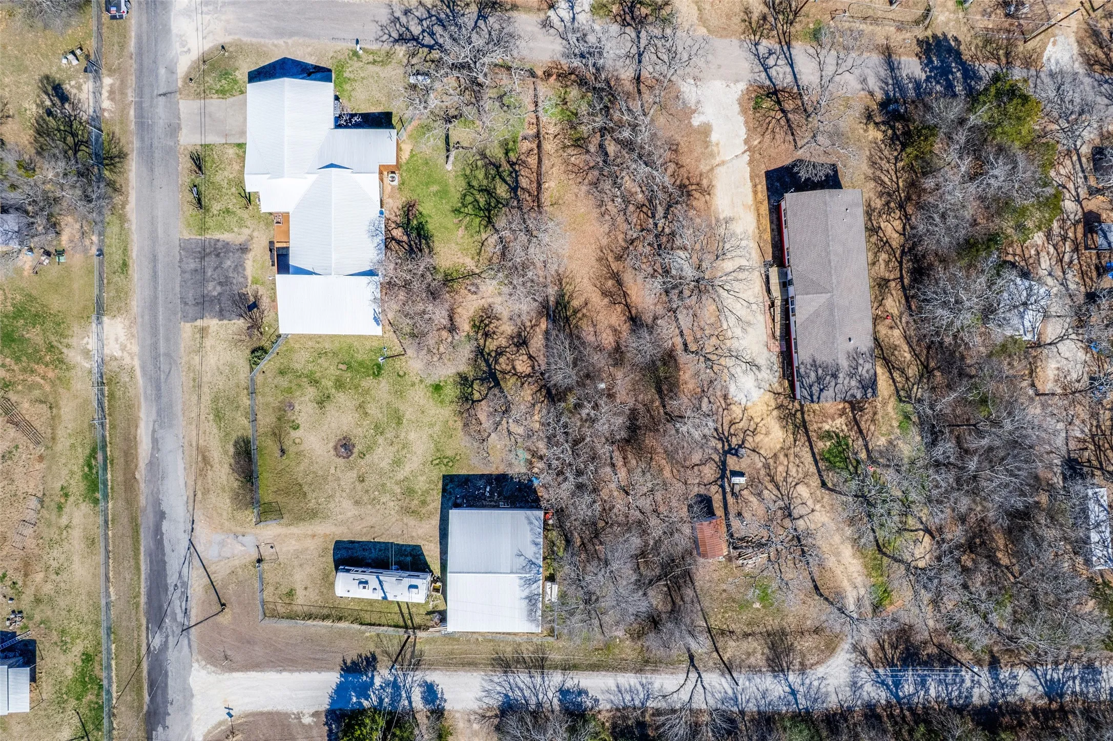 Arial view of Epsom home on the right and Mohawk on the left.  You can see the driveway goes all the way through the property