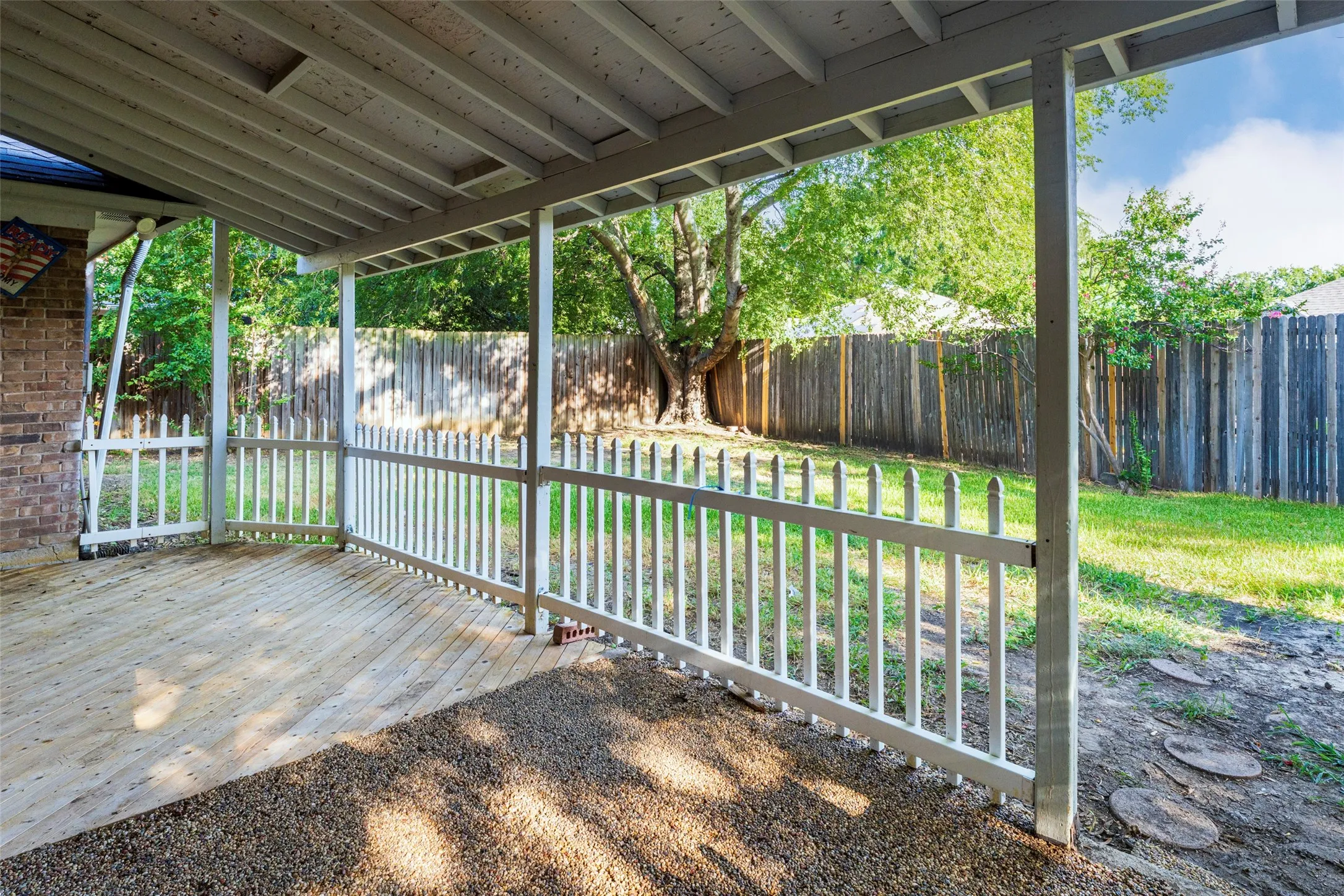 Backyard porch with lots of space to entertain