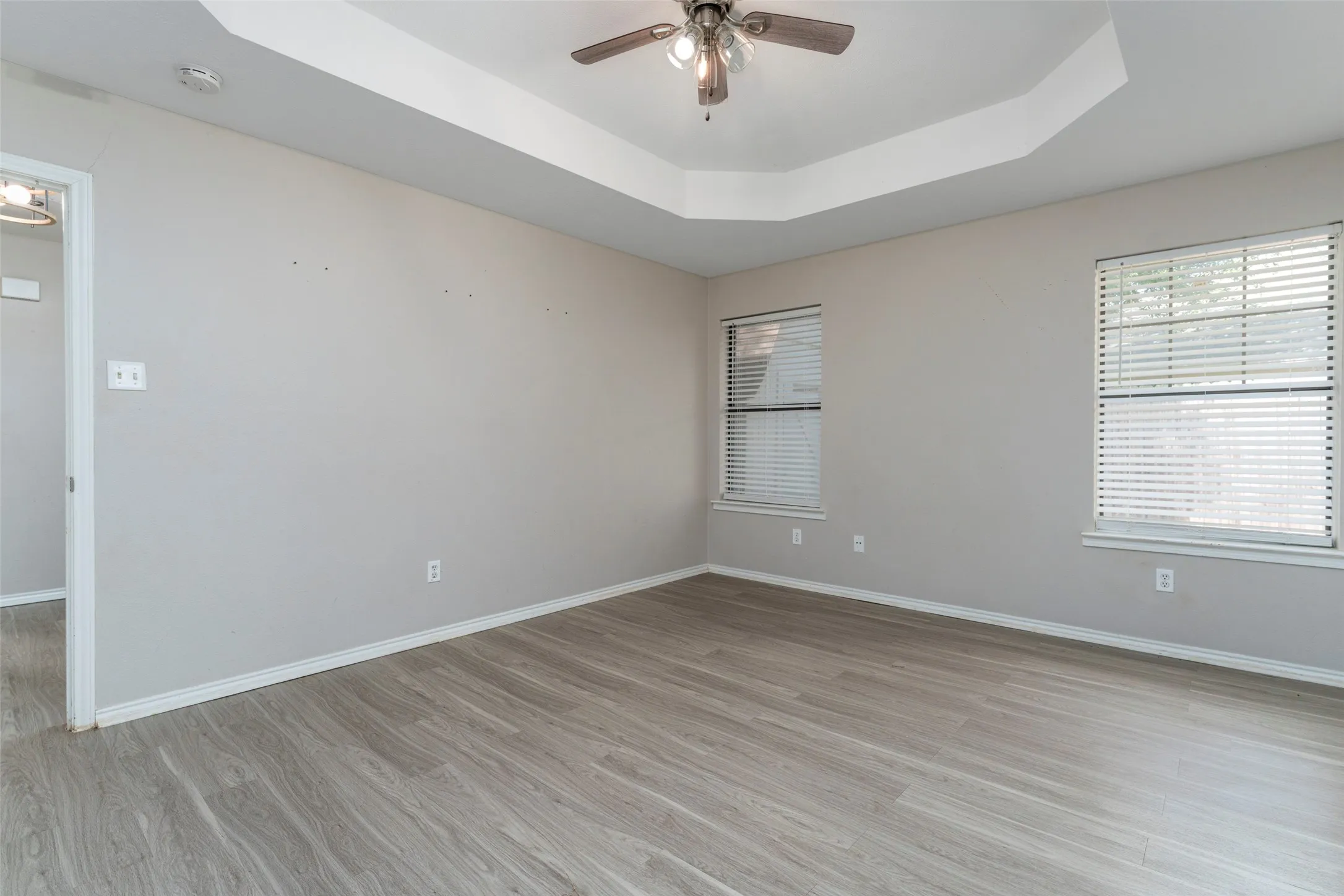Coffered ceiling in primary bedroom