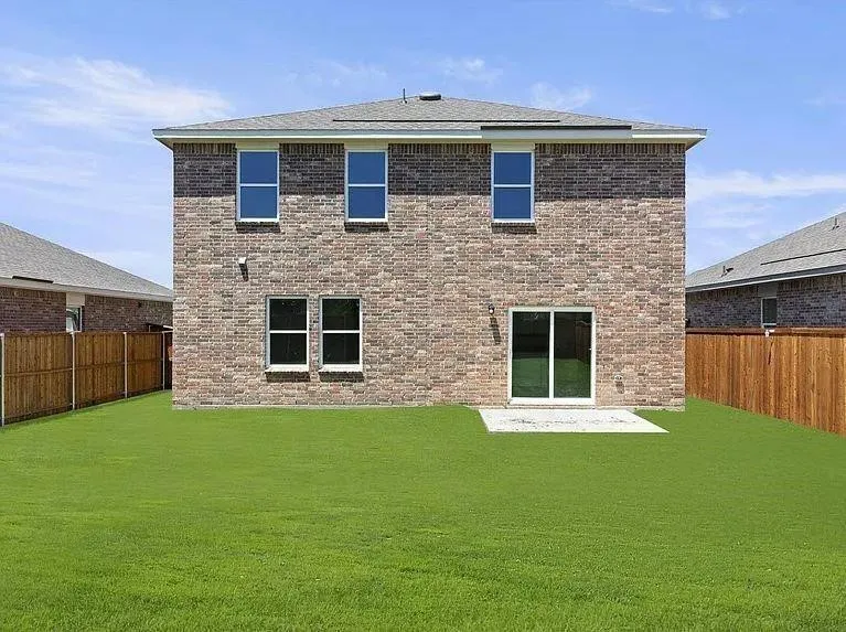 Expansive green lawn providing ample outdoor space