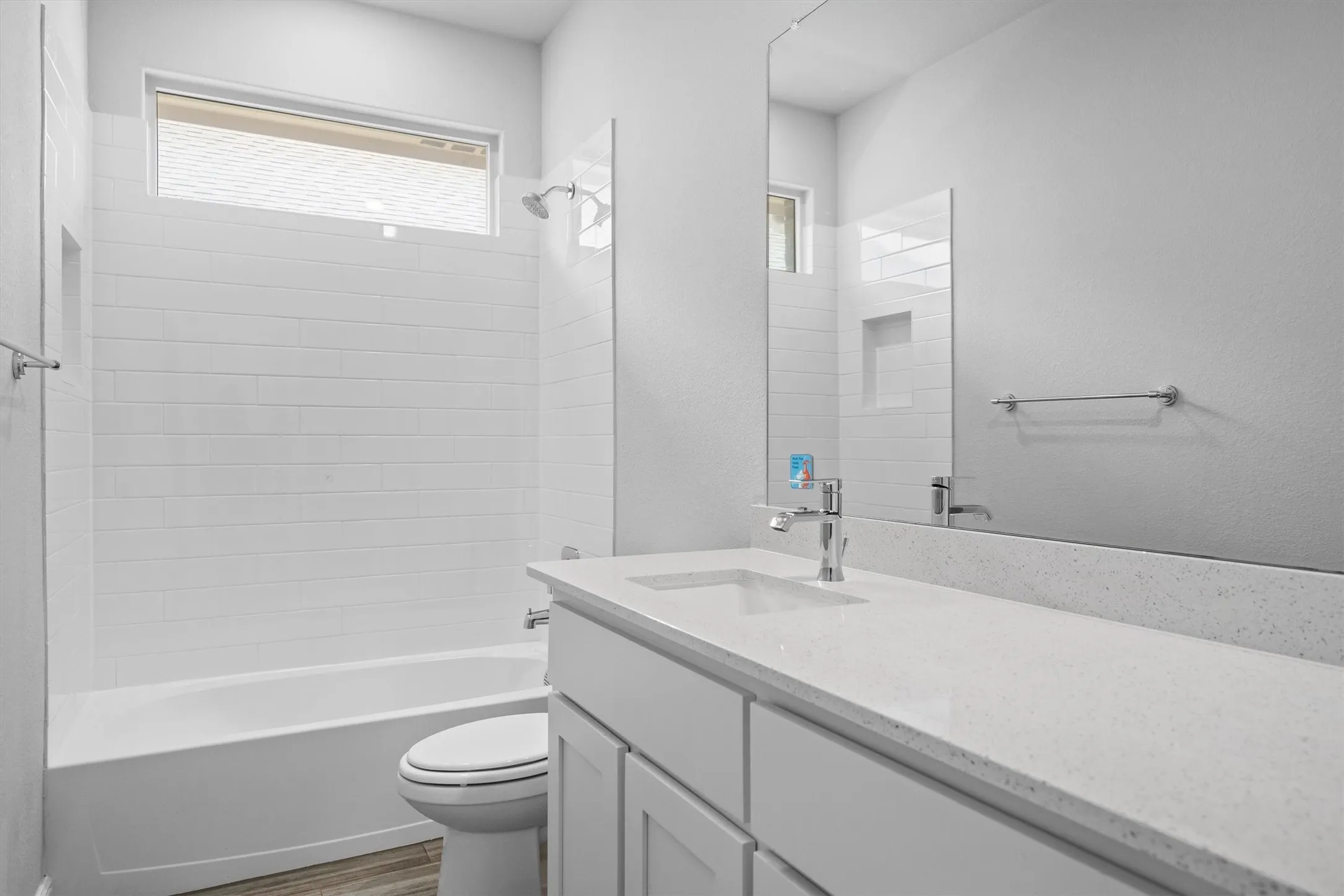 Secondary bathroom with an abundance of counter space