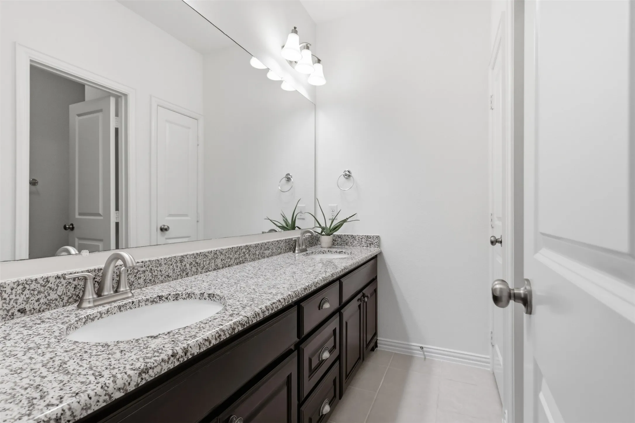 Upstairs bathroom with double sinks