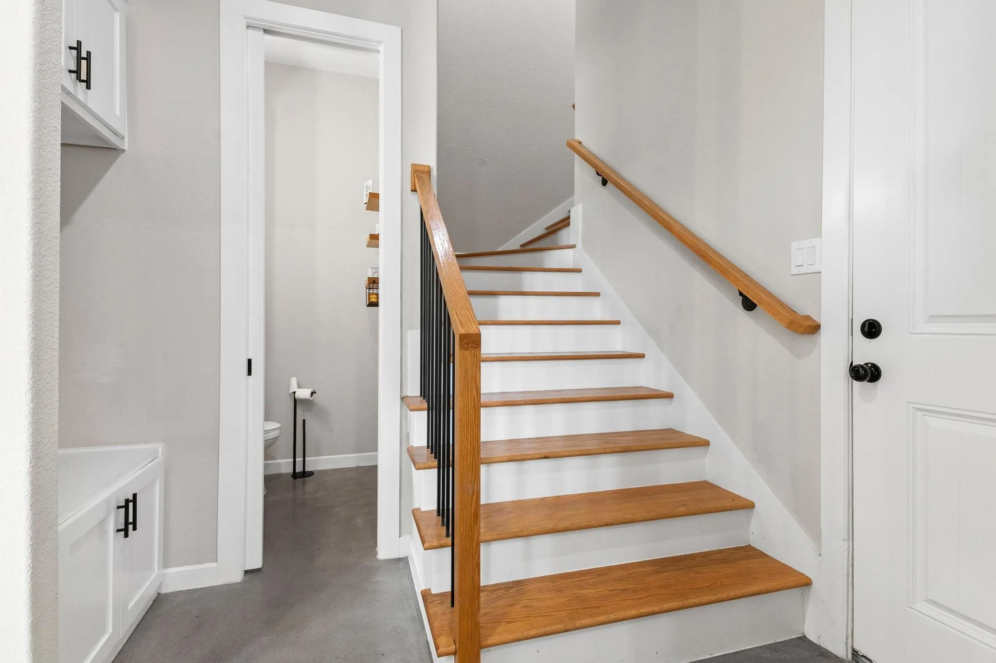 Stair, Cubby & half bath off garage

