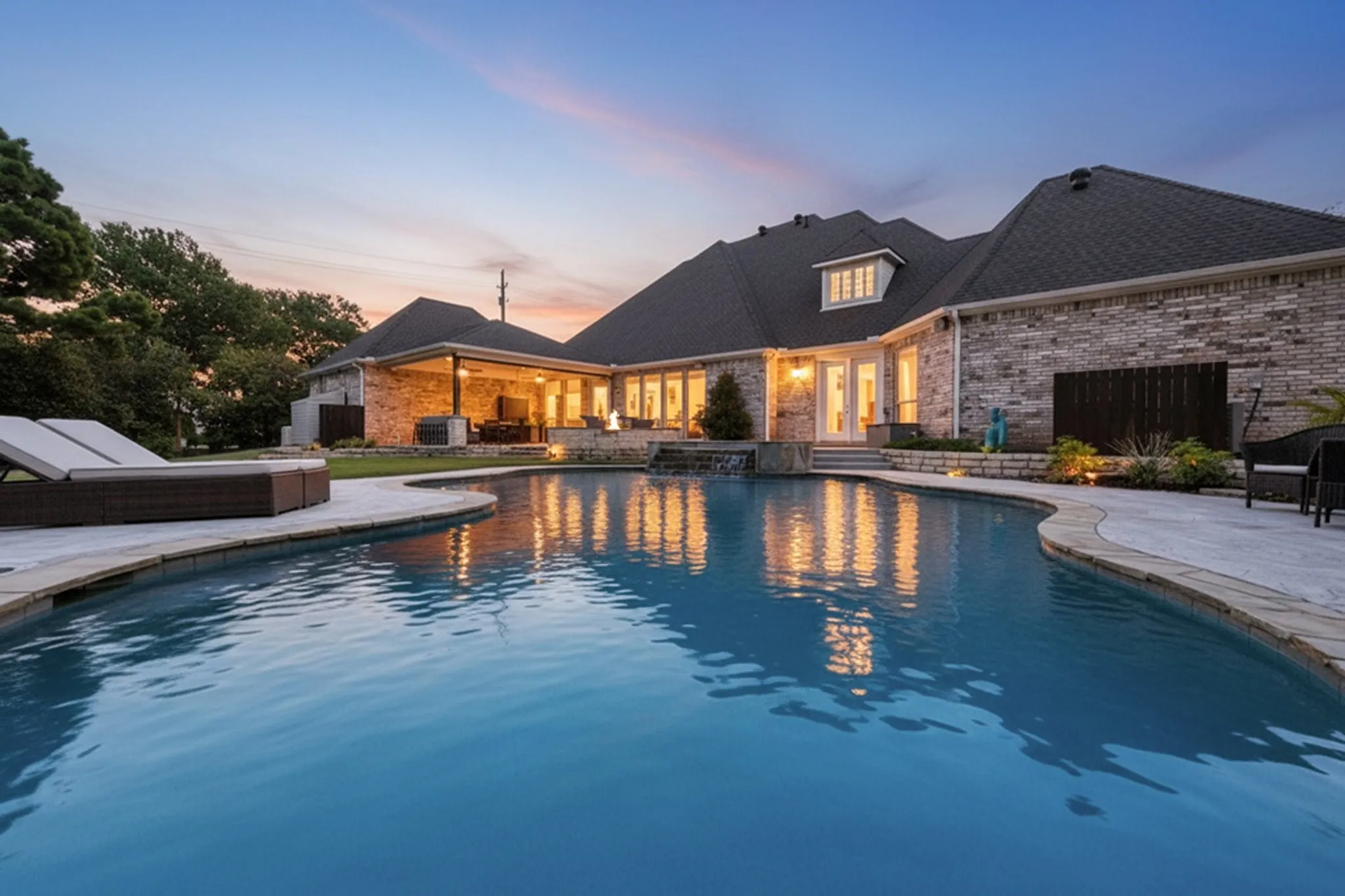 Resort style backyard with pool and firepit
