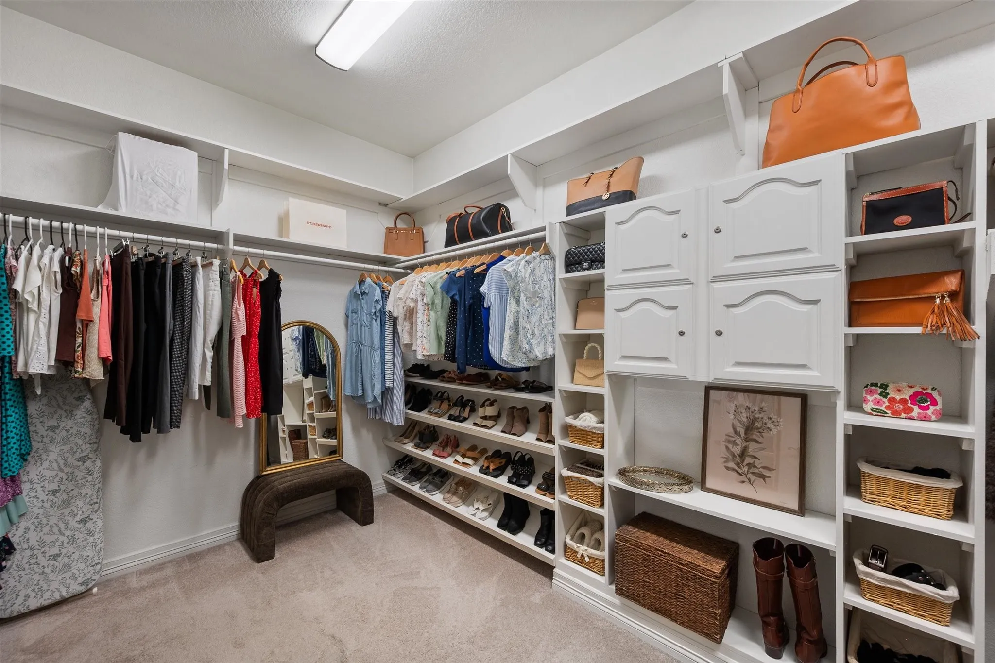 Large walk-in closet in primary bedroom.
