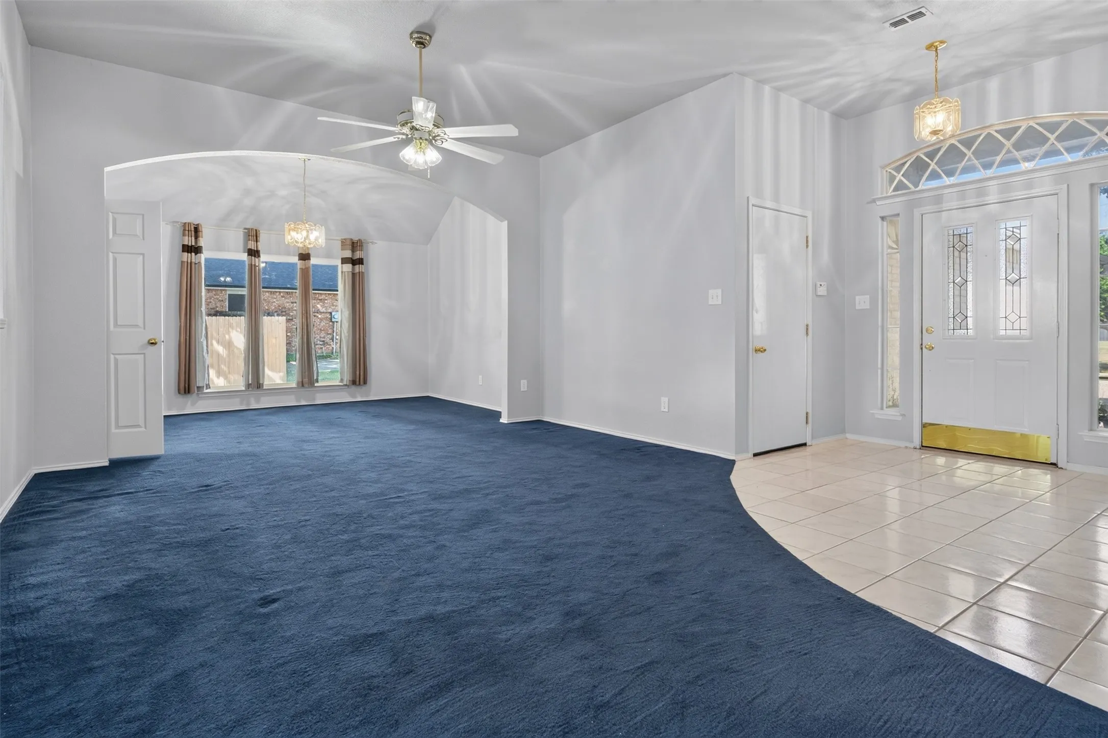 Entry, living, and dining rooms
