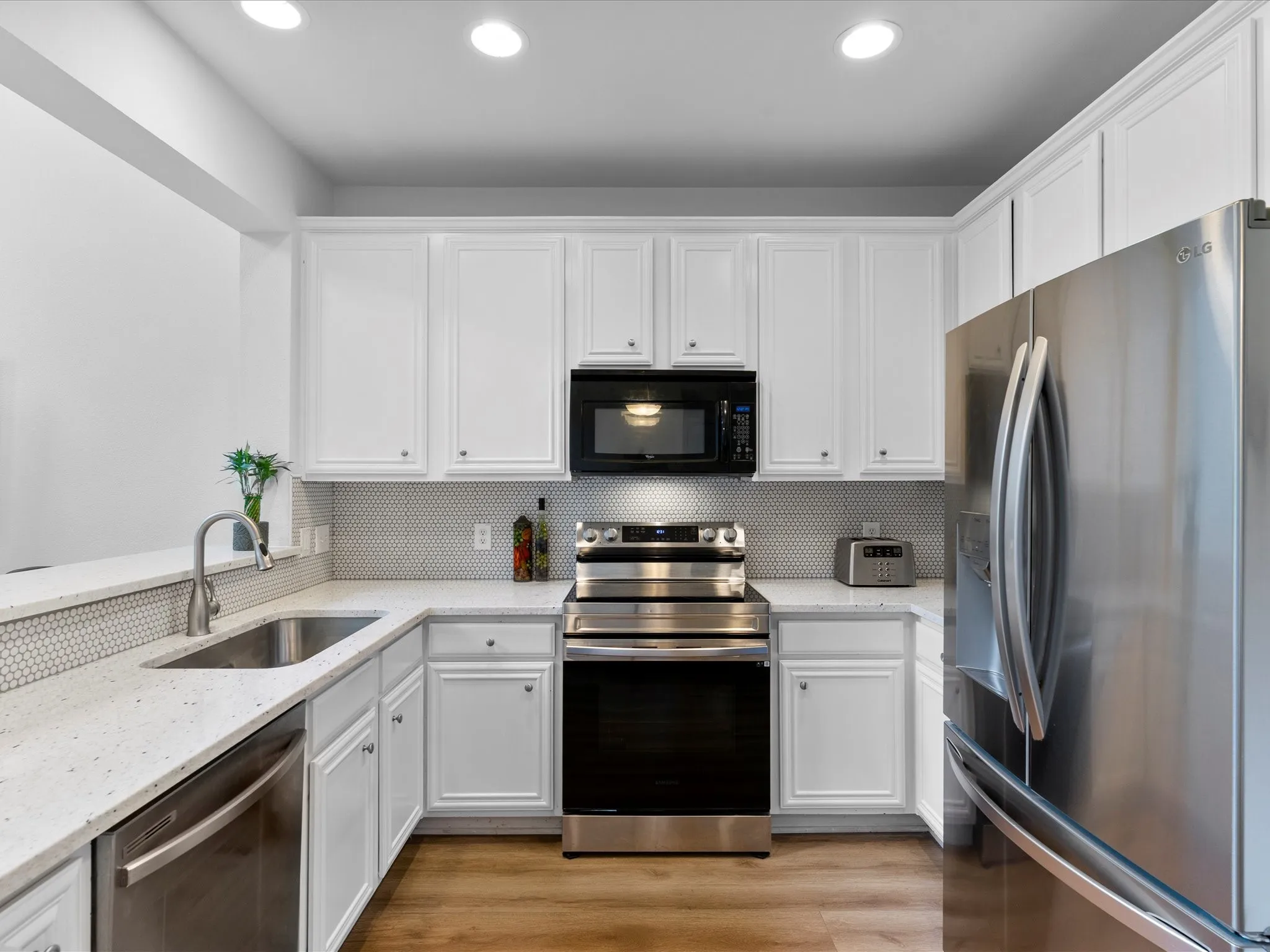 Upgraded counters, backsplash and sink