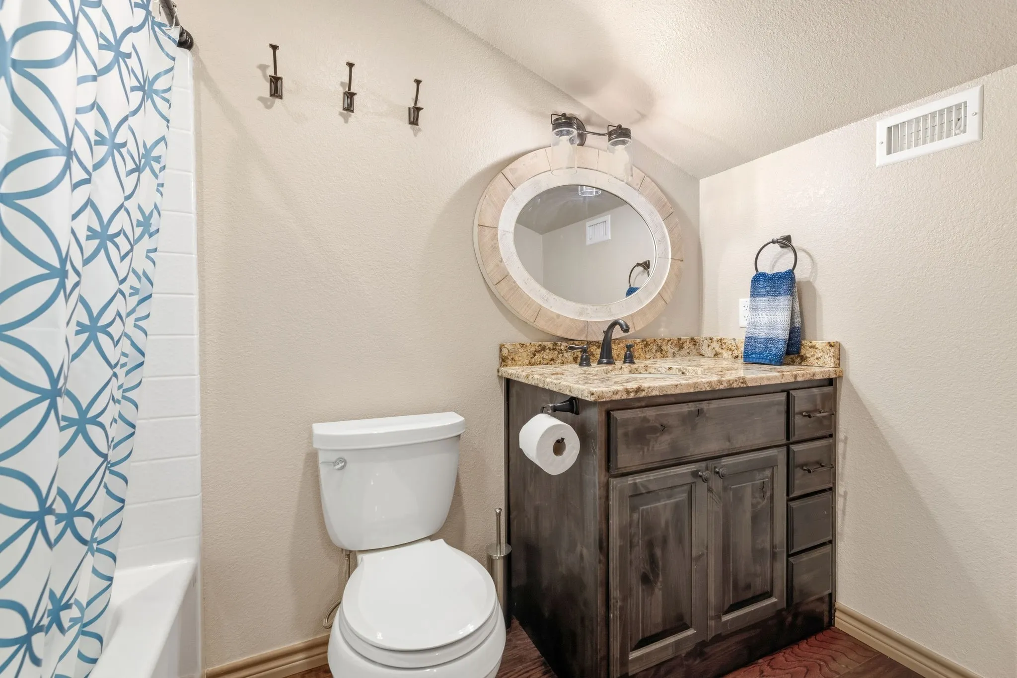 Convenient upstairs full bathroom with granite countertop vanity, tub/shower combo, plenty of storage-perfect to accompany the loft space.