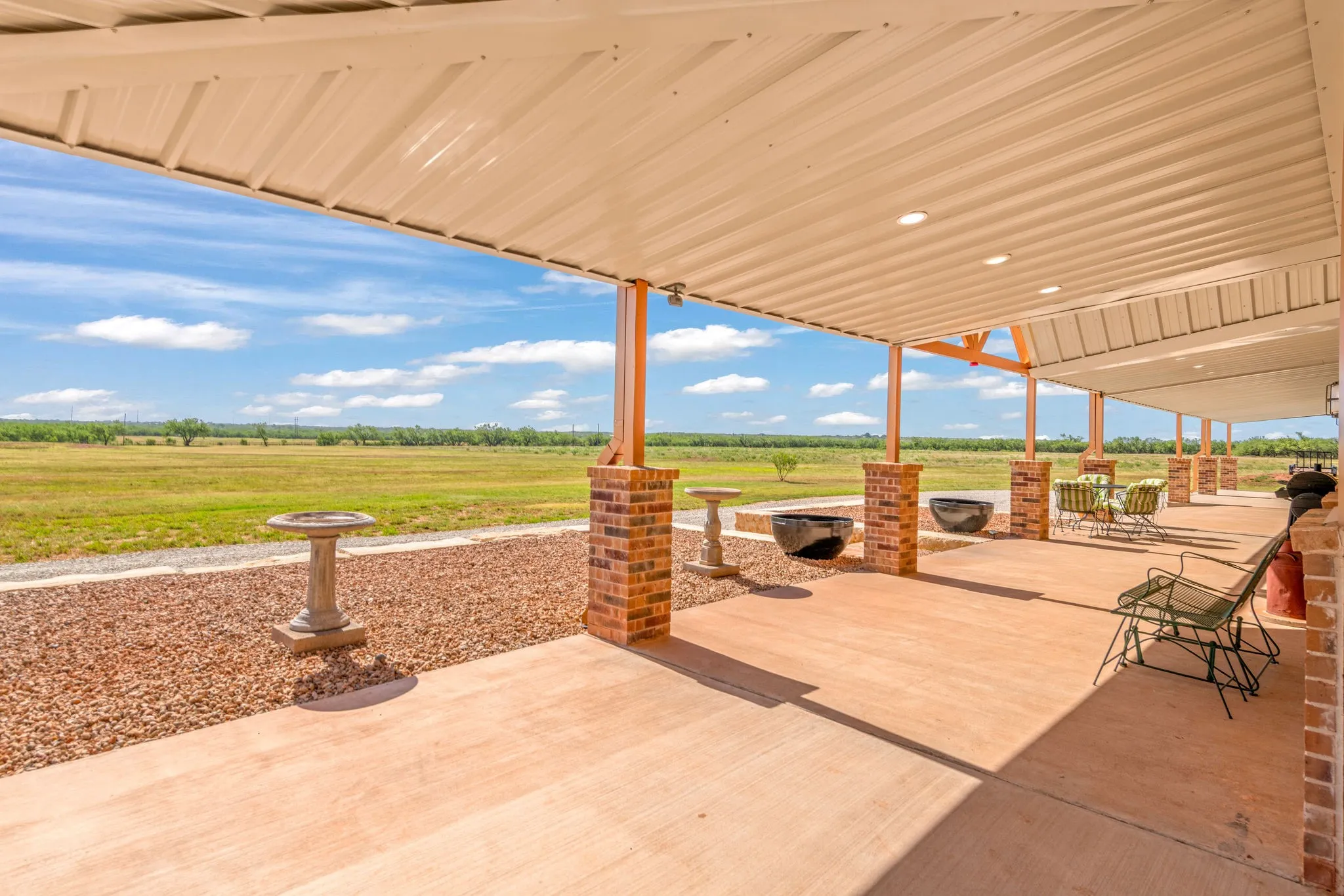 Large covered patio stretches the length of the home.