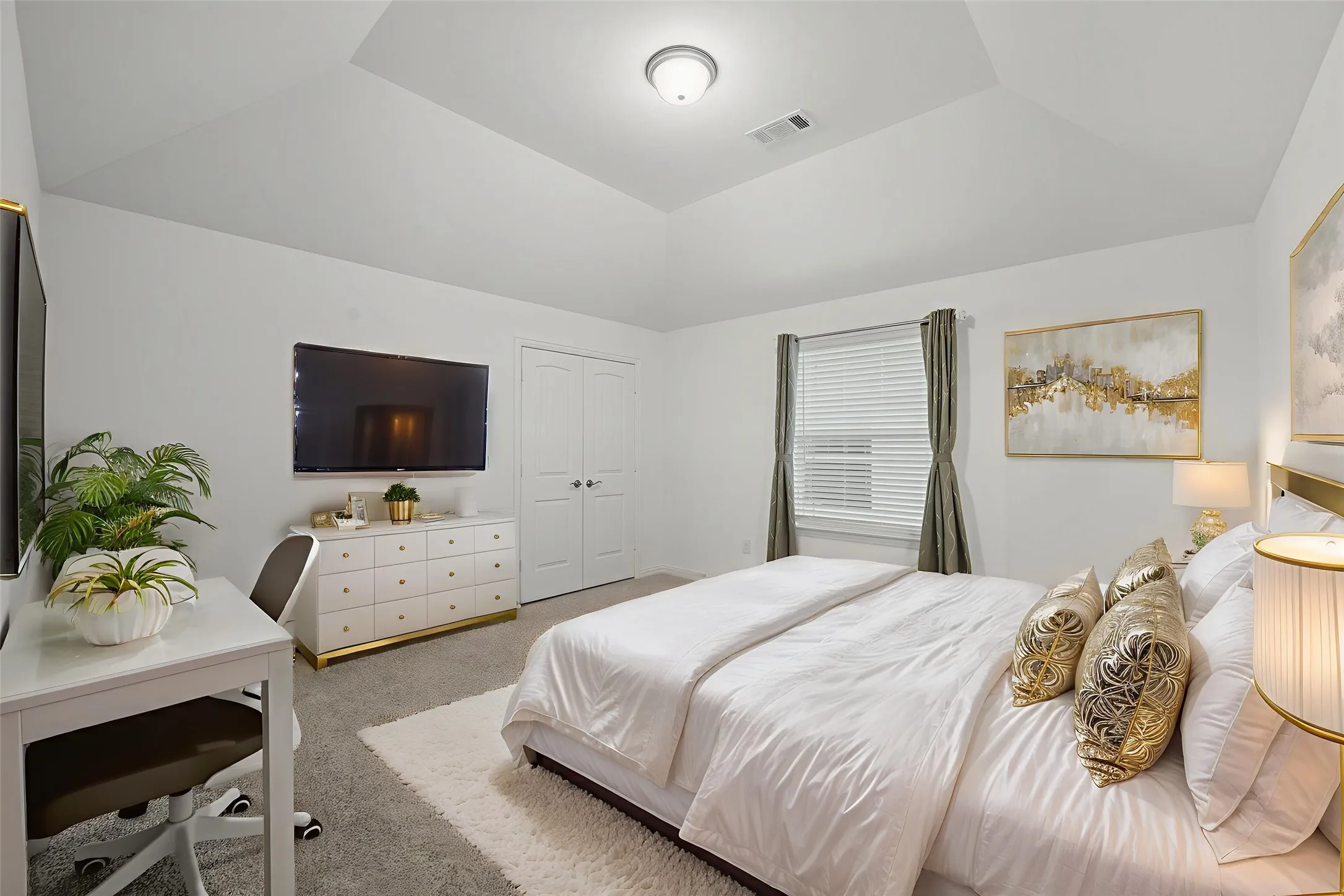 Vaulted ceiling bedroom featuring plush gray carpeting, white walls, double-door closet, and a window with blinds