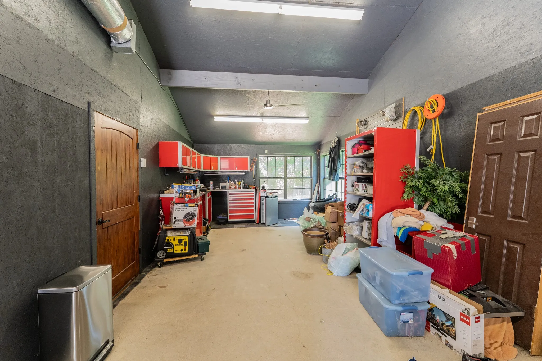 Garage is heated and cooled.  This area was a bedroom, converted to shop.