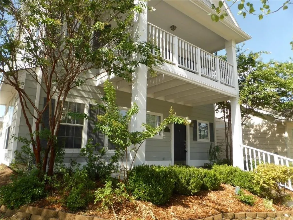 View of home's exterior featuring a balcony
