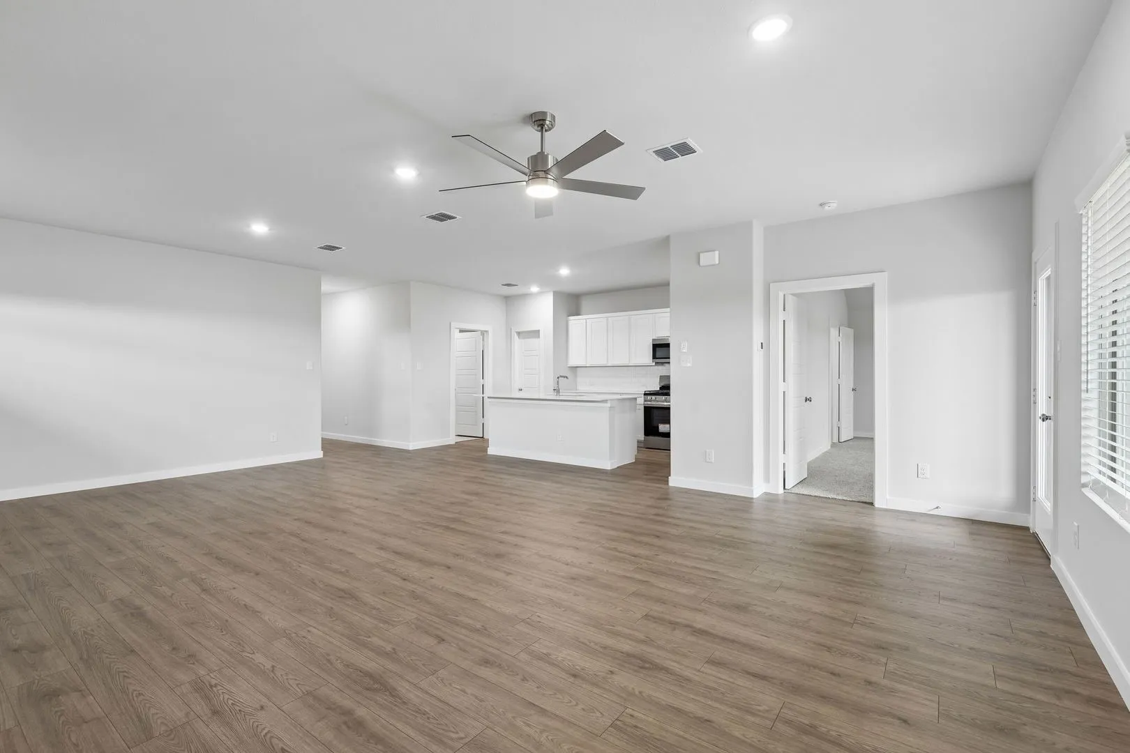 Open Floor Plan in the Oscar home plan by Trophy Signature Homes – REPRESENTATIVE PHOTO