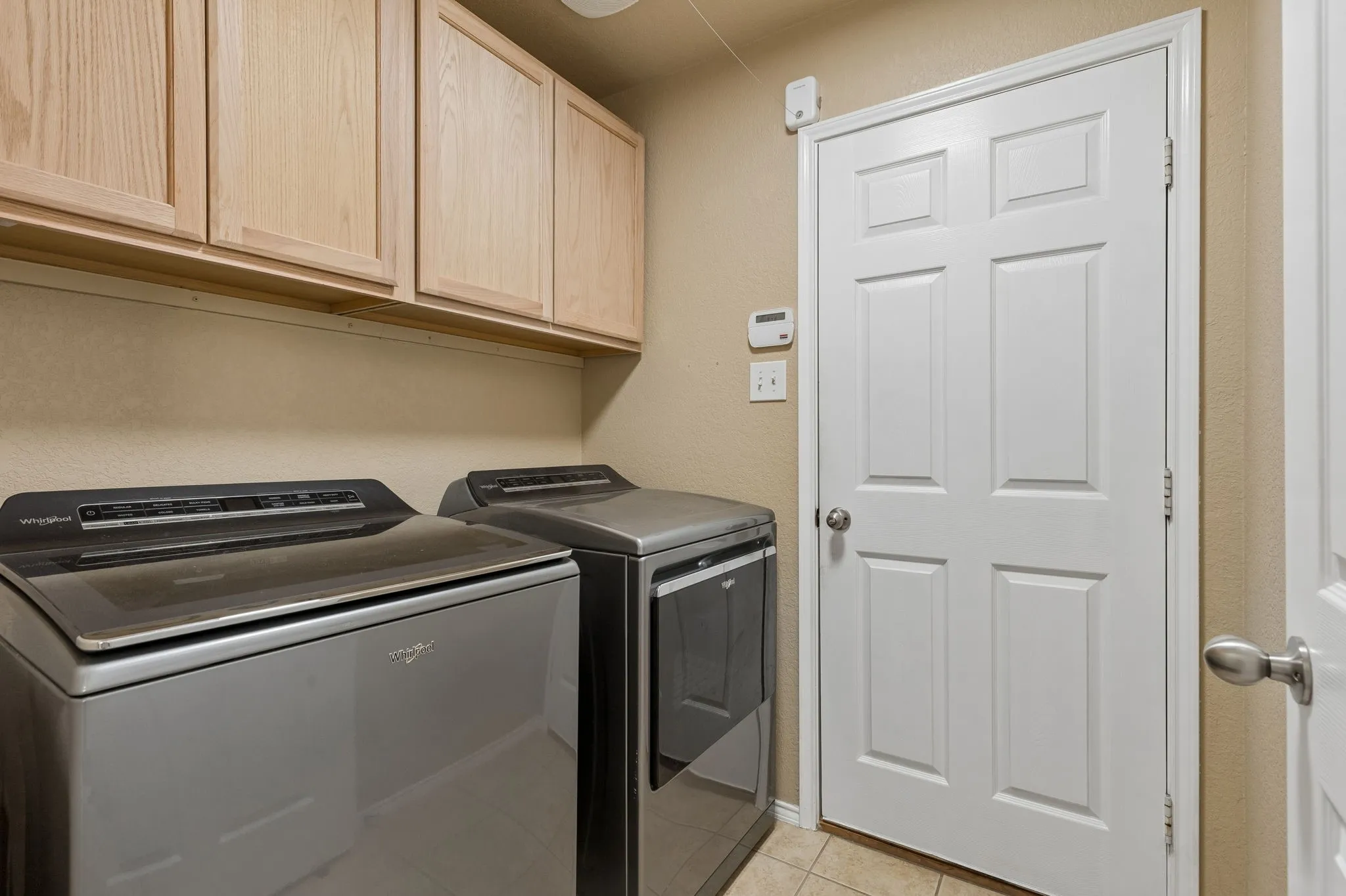 Laundry room with new built-in cabinets