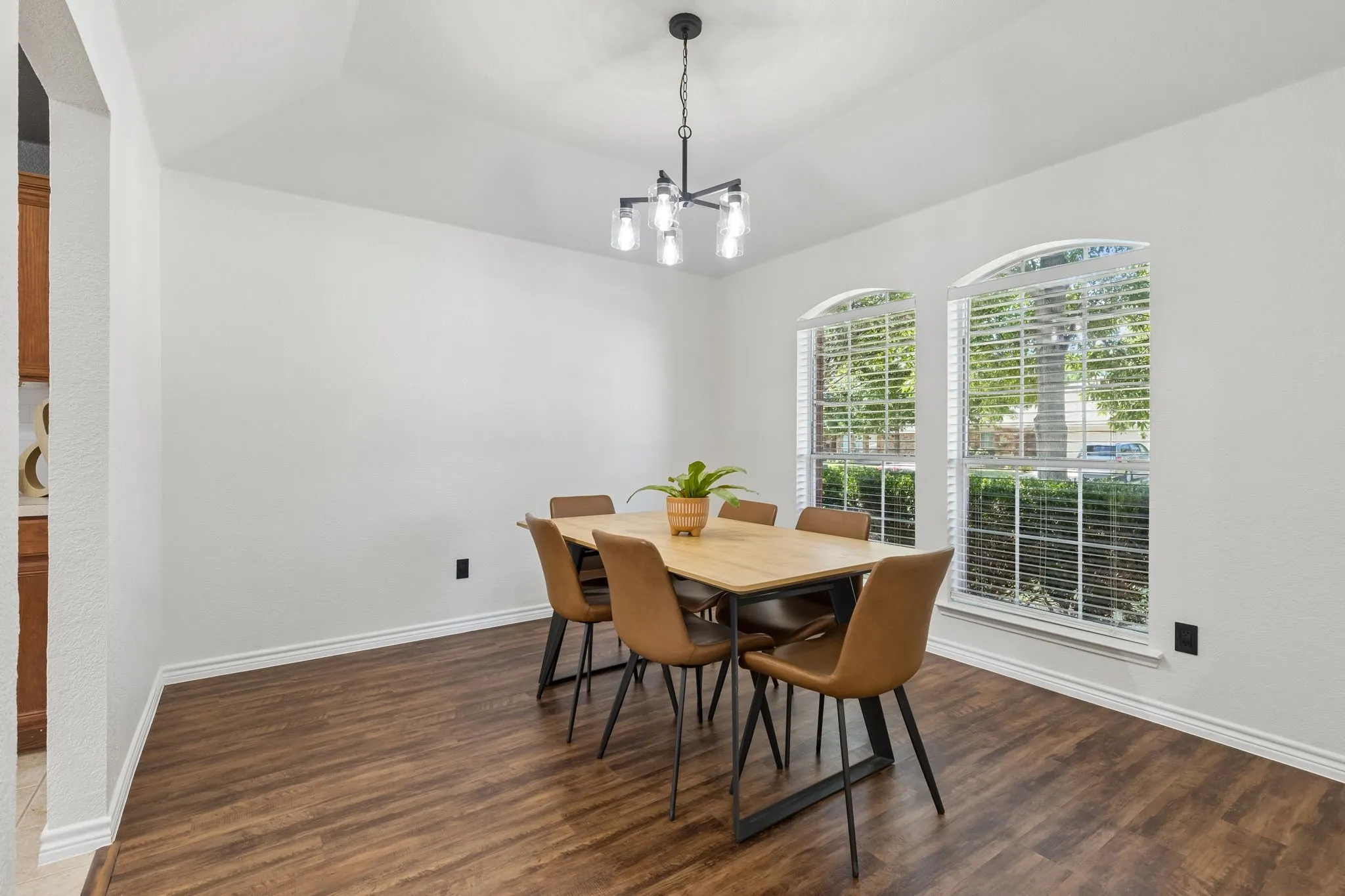 Dining area off the kitchen with new light fixture