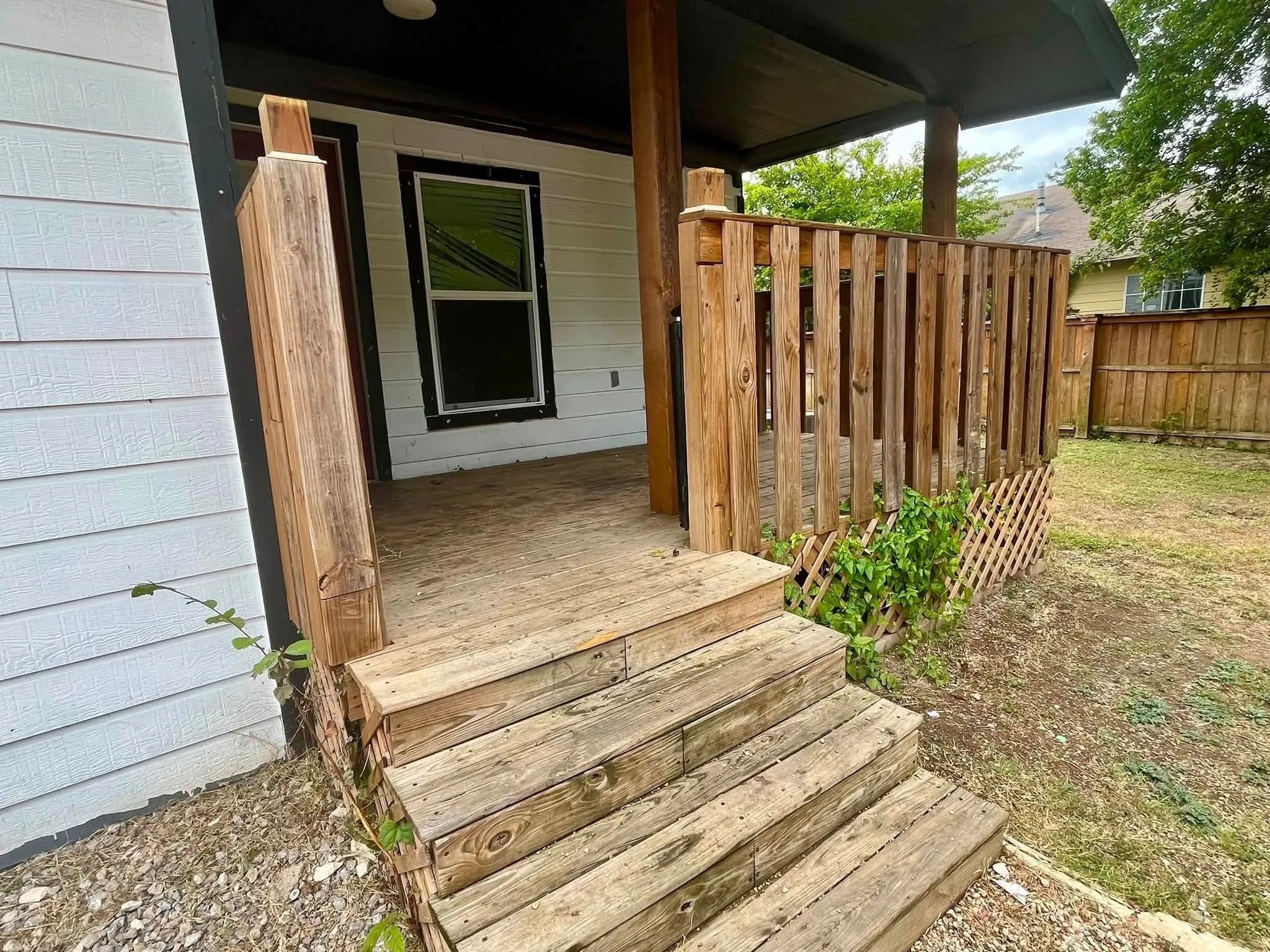 relaxing deck with privacy fence