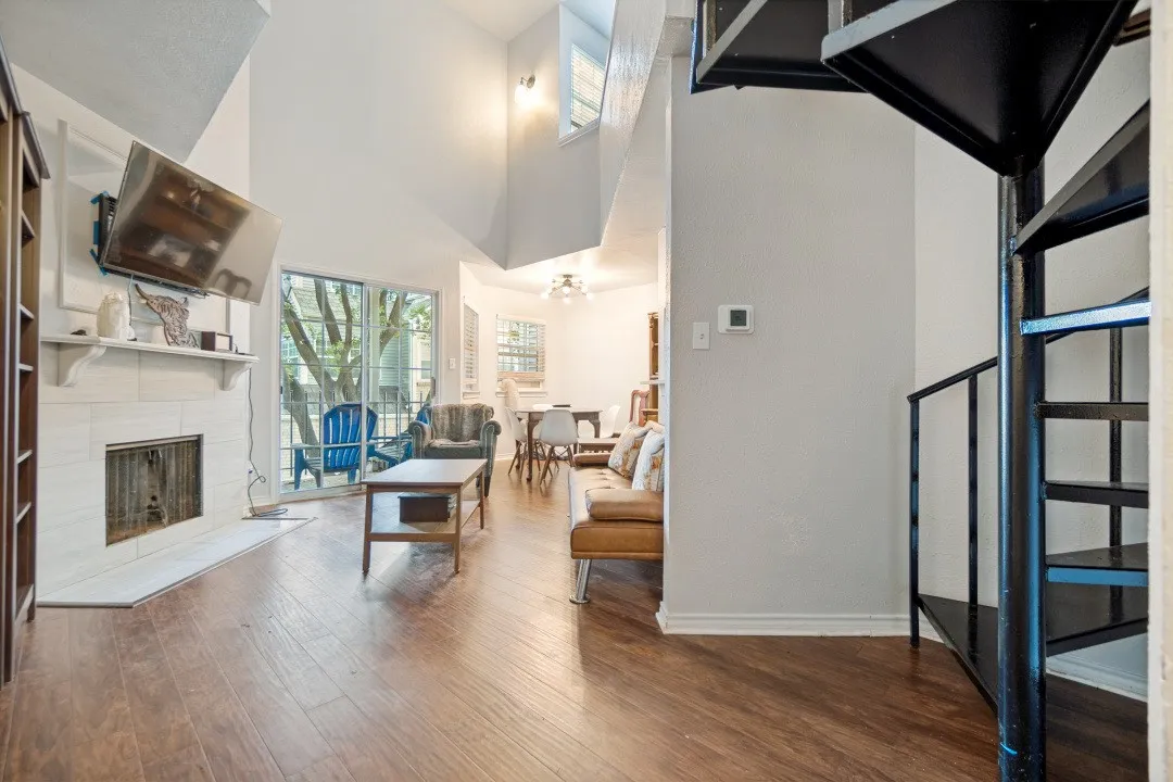 The spiral staircase leads to the bedroom, utility, and bathroom.