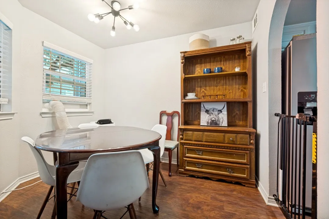 Updated Lighting and great corner nook for dining.